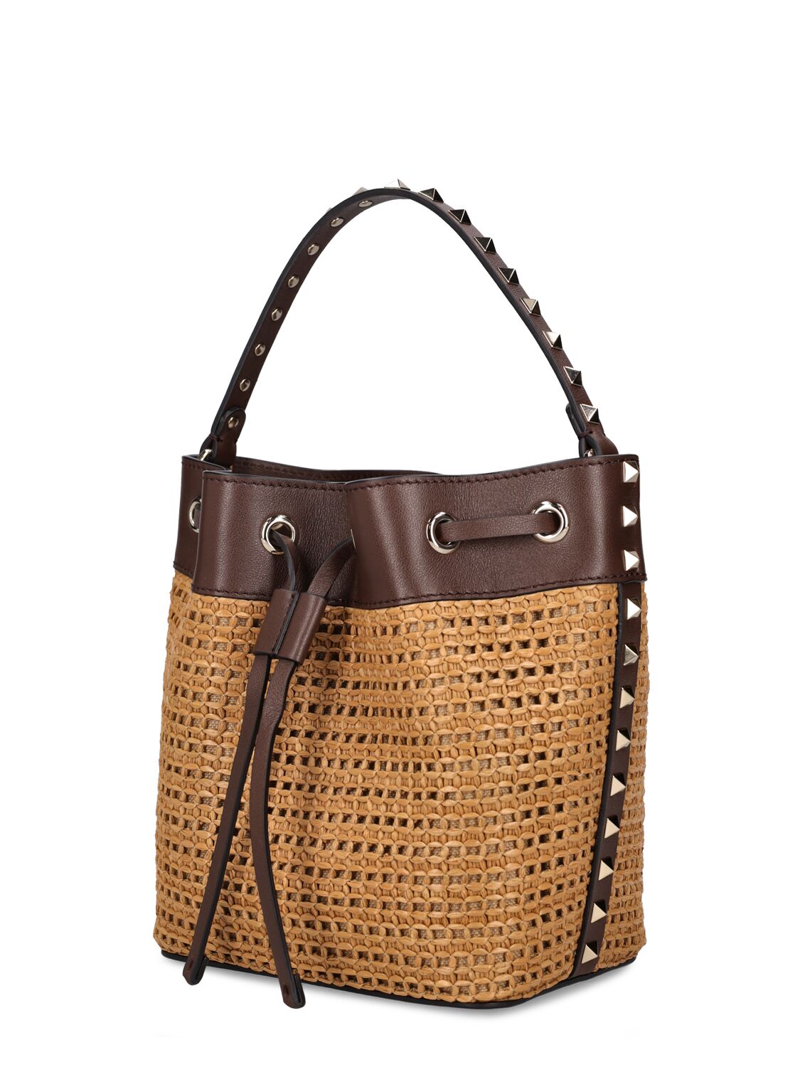 Shop Valentino Rockstud Raffia Effect Bucket Bag In Tabacco,cacao