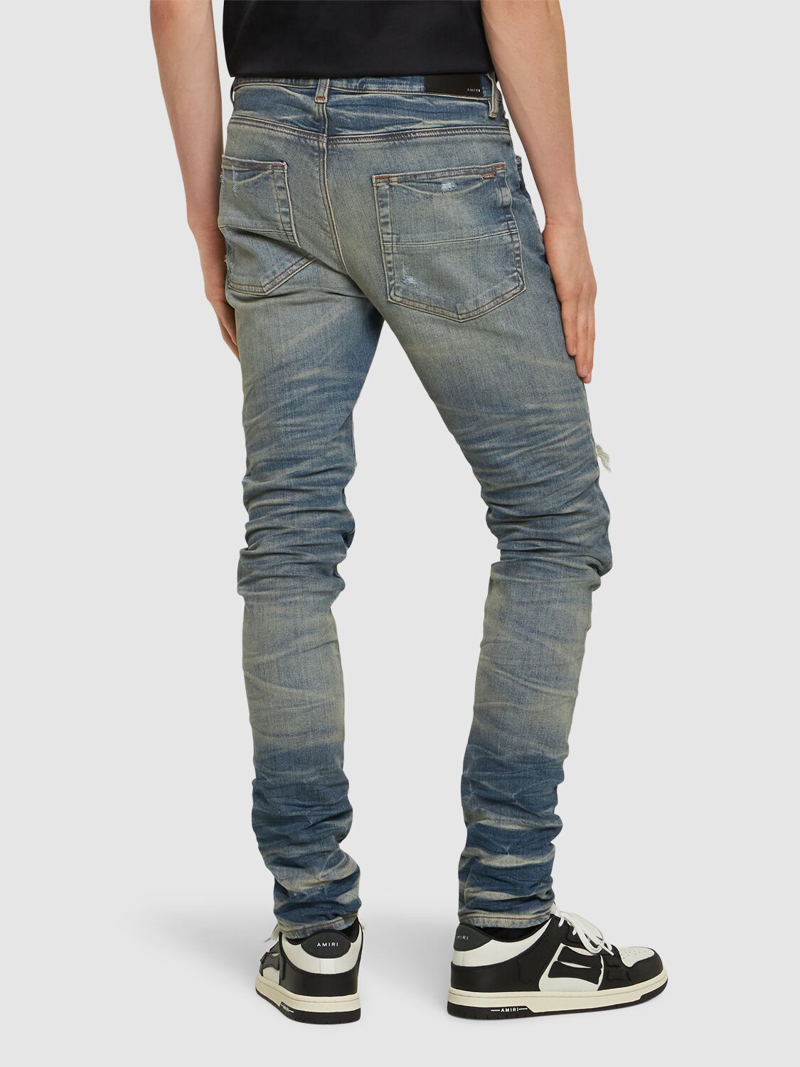 Shop Amiri Sequin Thrasher Cotton Stretch Jeans In Blue