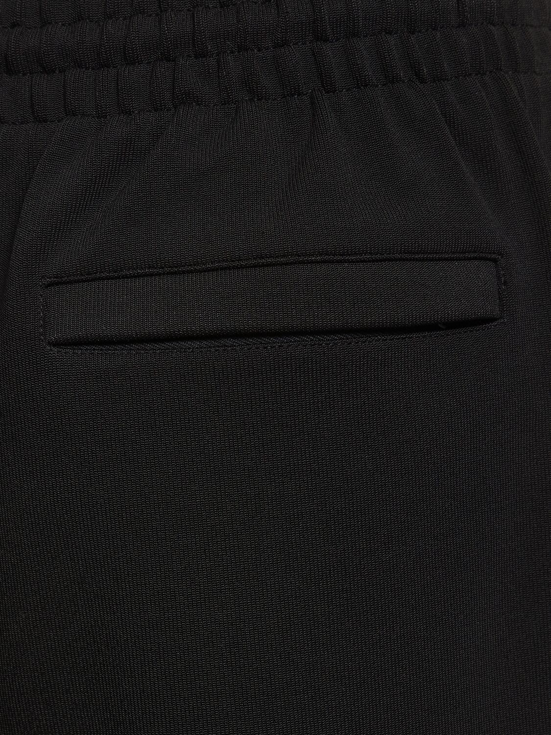 Shop Wardrobe.nyc Semi Matte Track Viscose Blend Pants In Black