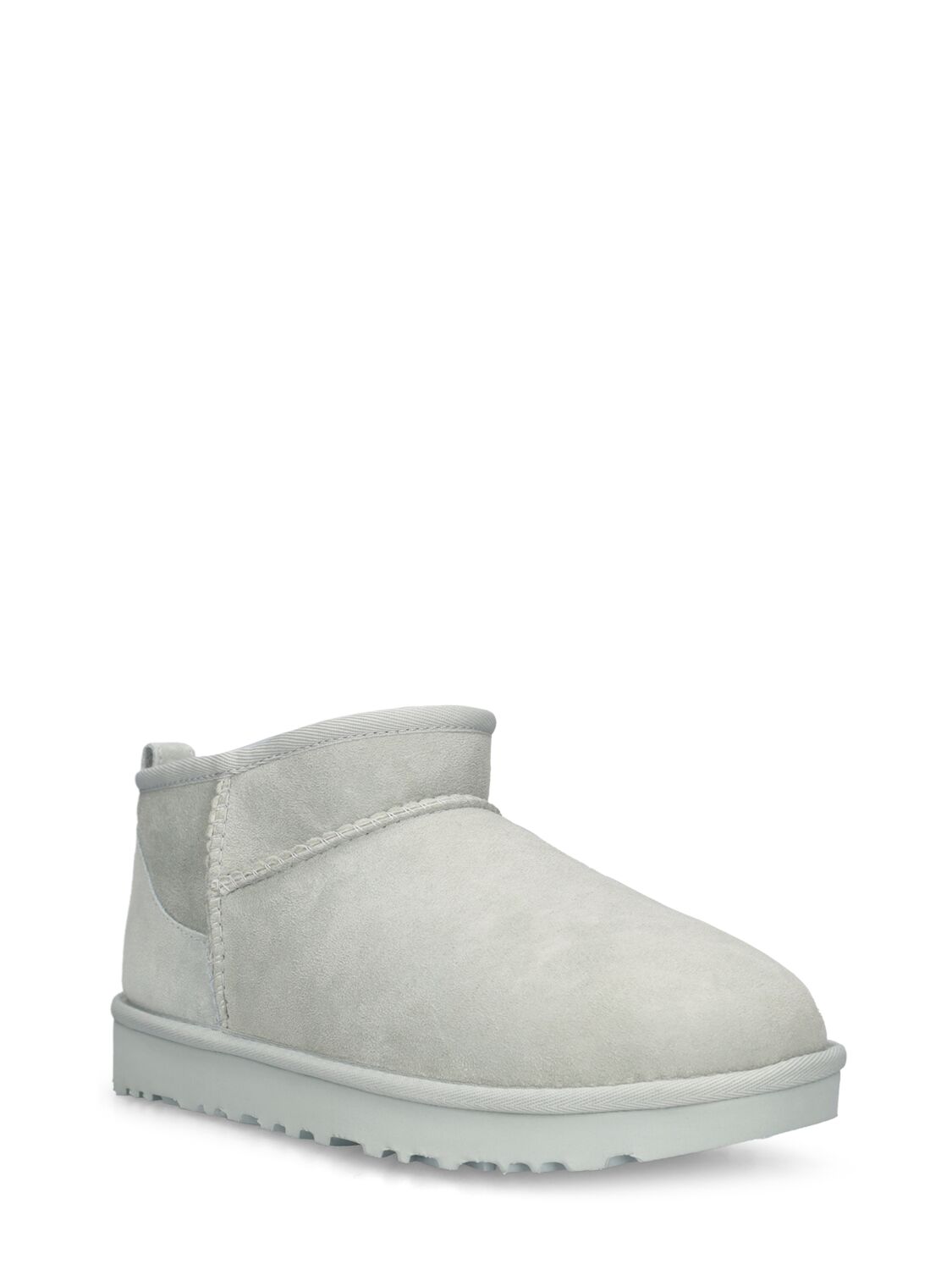 Shop Ugg 10mm Classic Ultra Mini Shearling Boots In Off White