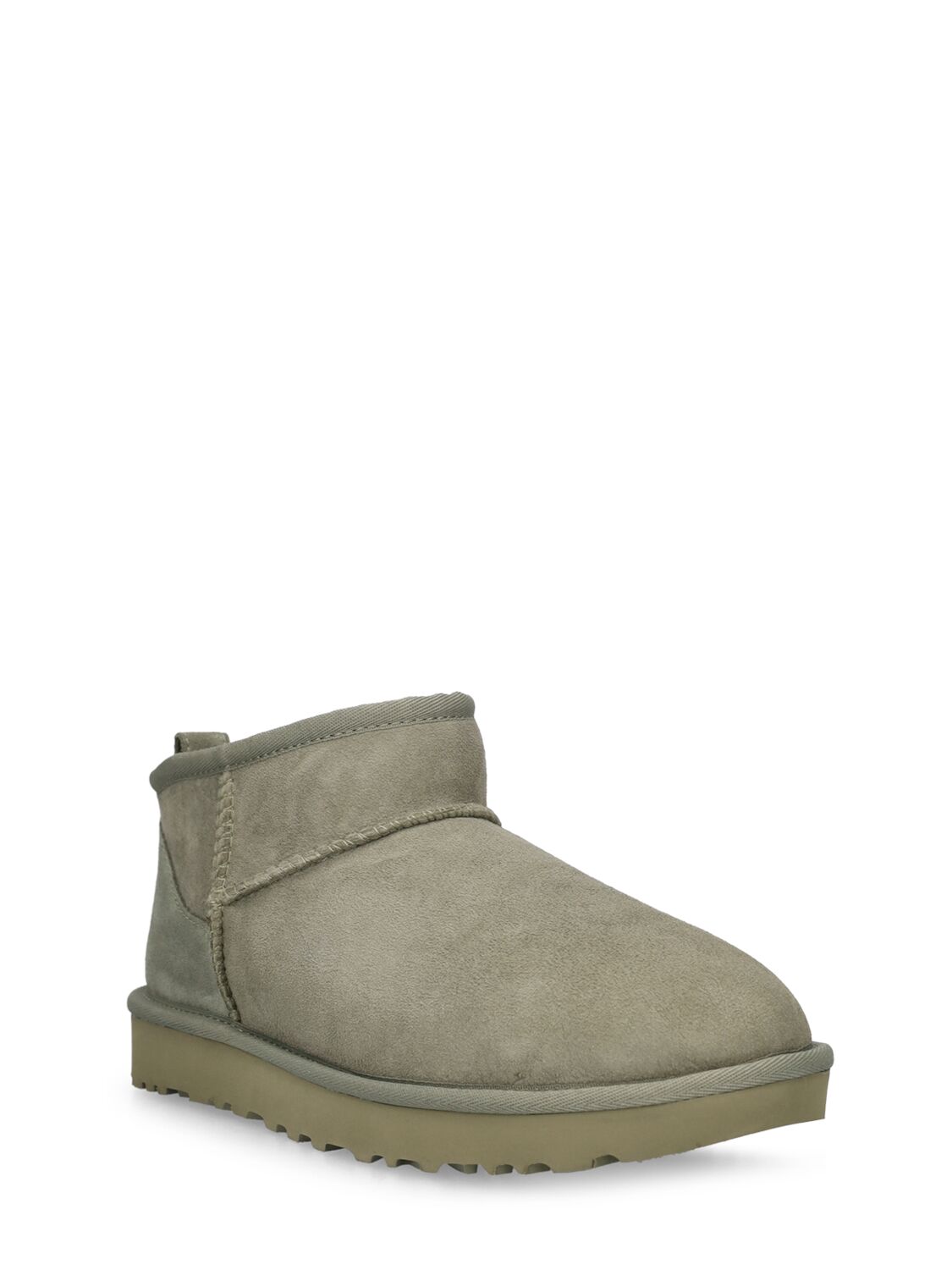 Shop Ugg 10mm Classic Ultra Mini Shearling Boots In Olive Green
