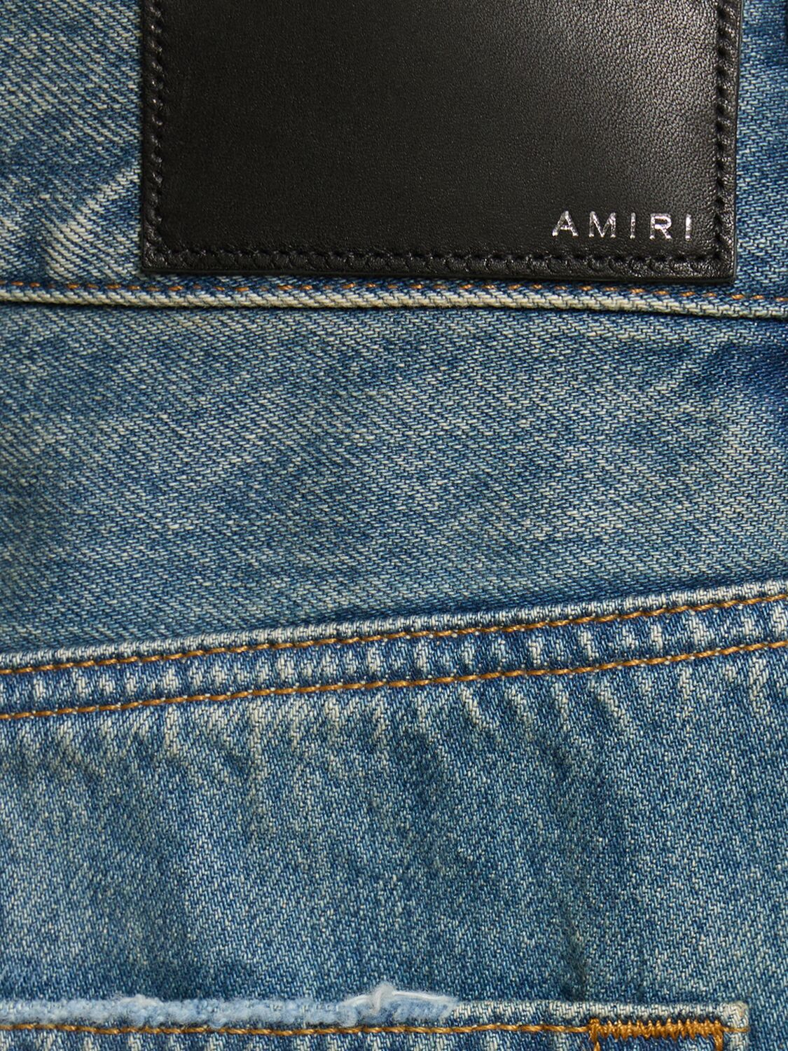 Shop Amiri Baggy Cotton Denim Jeans In Indigo