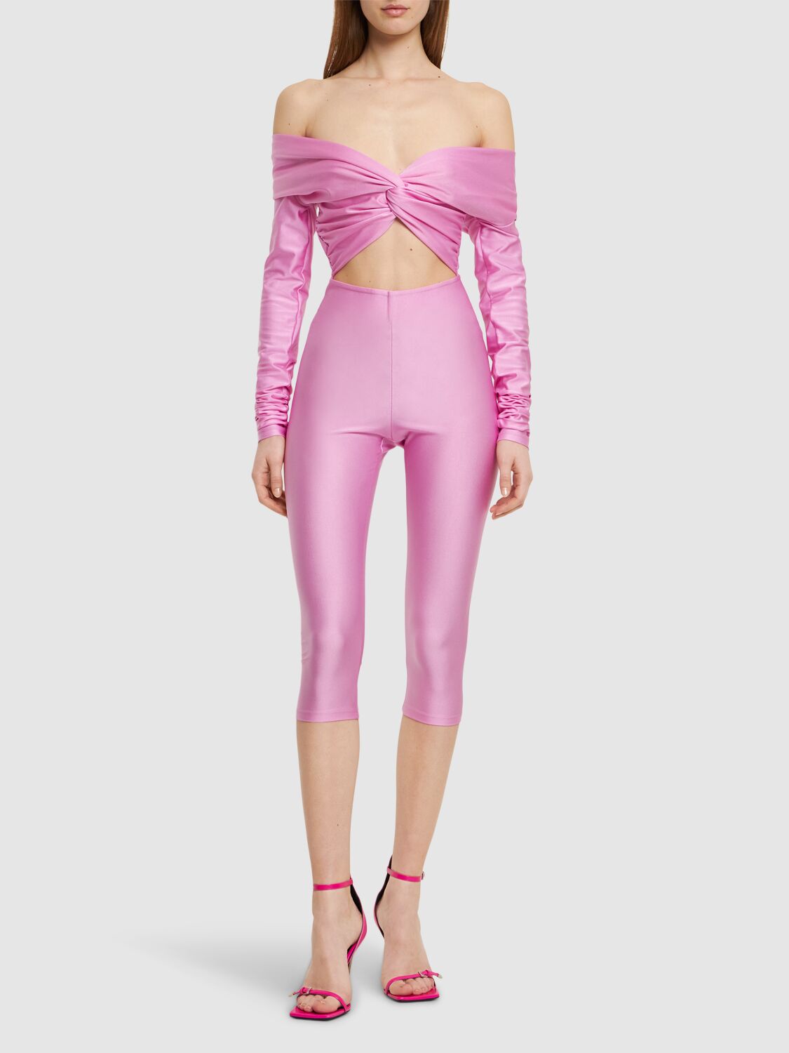 Shop The Andamane Kendall Shiny Lycra Long Sleeve Jumpsuit In Pink
