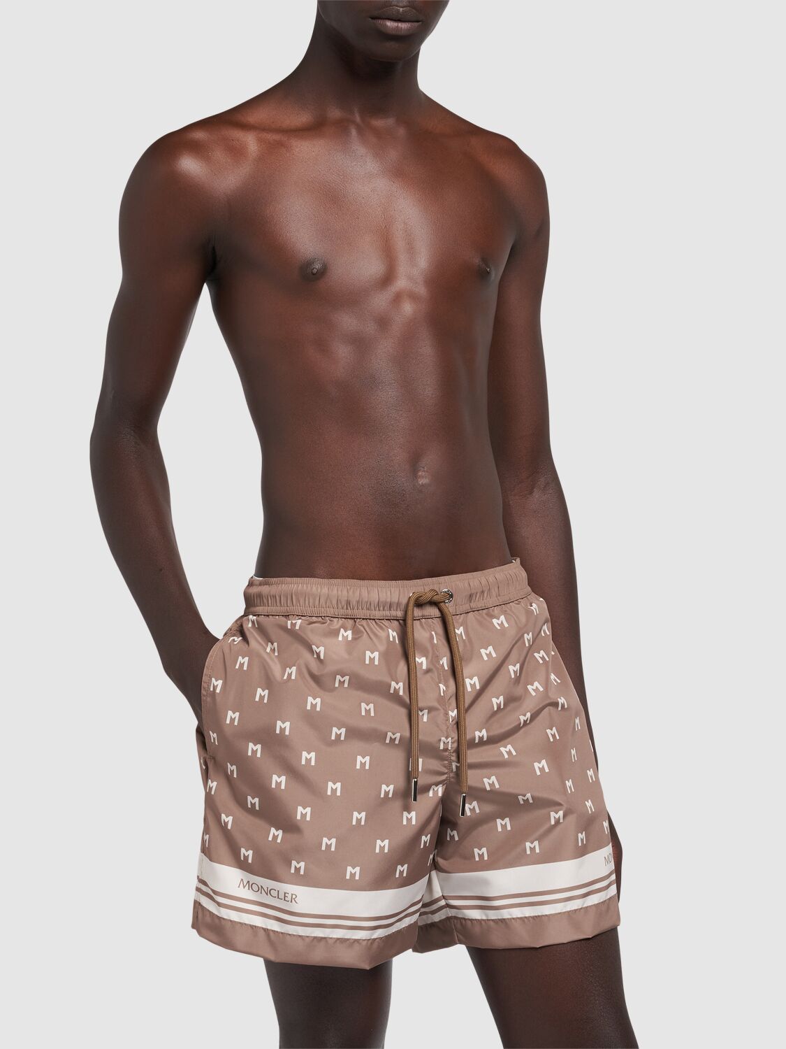 Shop Moncler Monogram Printed Tech Swim Shorts In 米黄色