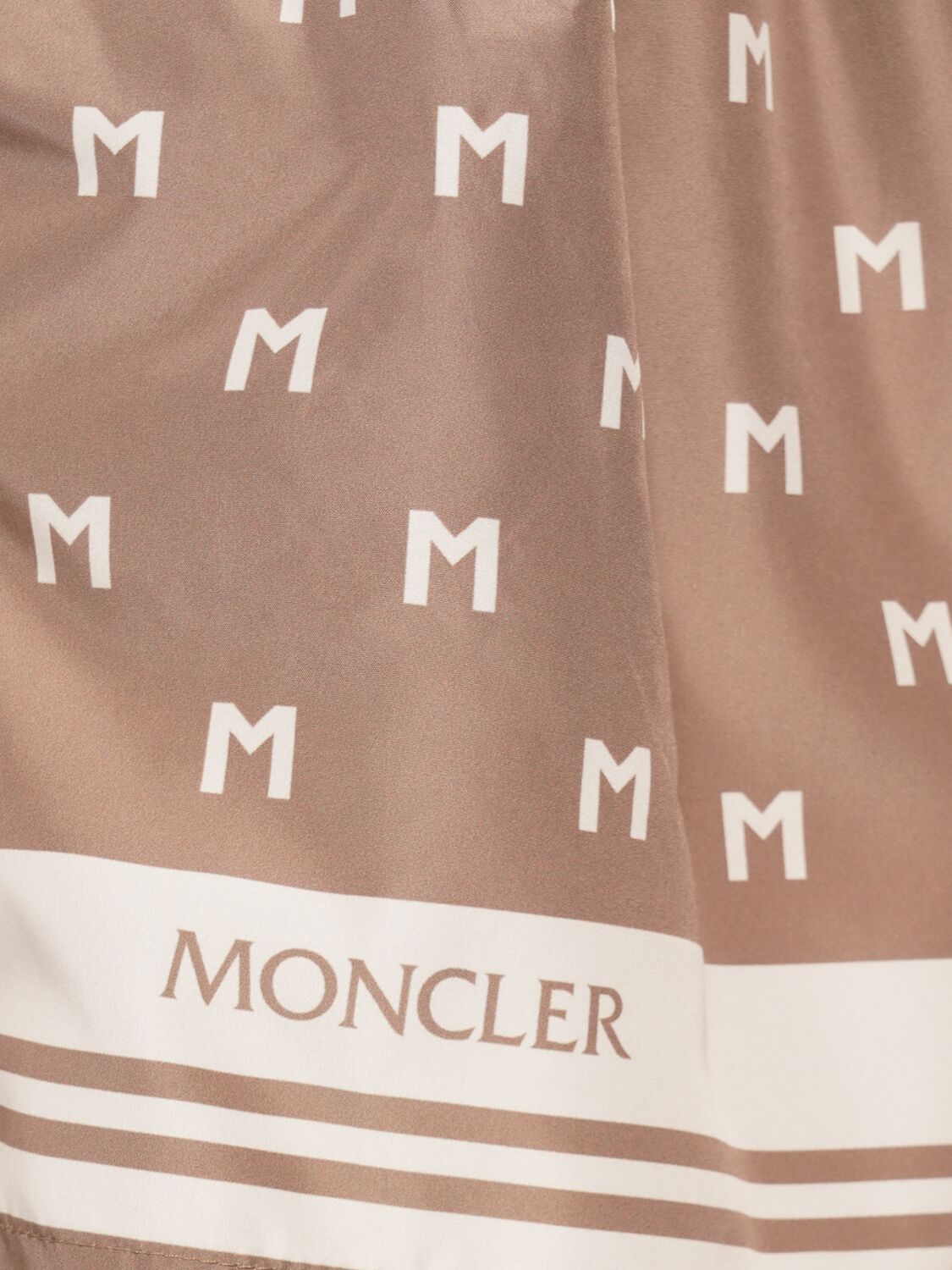 Shop Moncler Monogram Printed Tech Swim Shorts In 米黄色