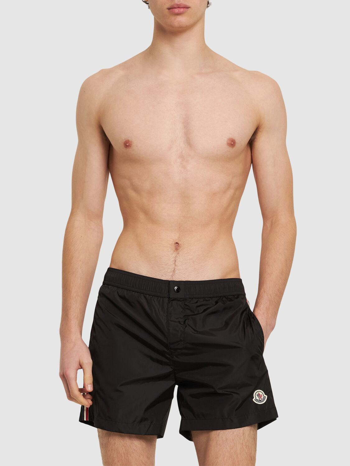 Shop Moncler Logo Nylon Swim Shorts In 黑色