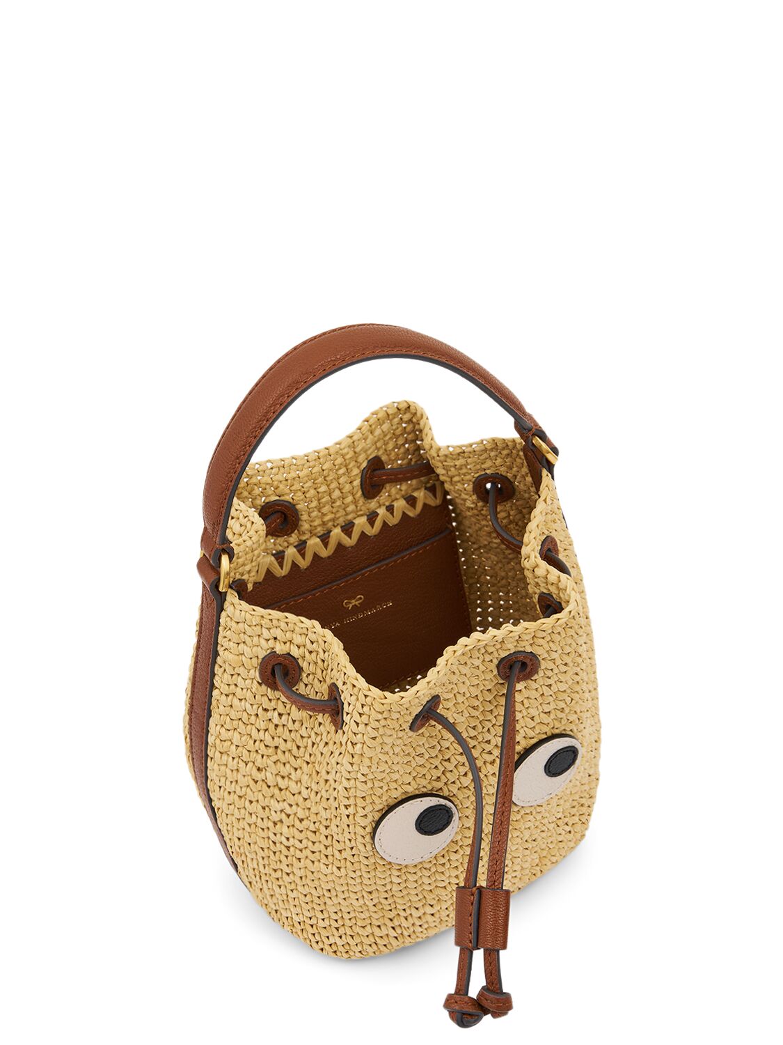 Shop Anya Hindmarch Eyes Raffia Top Handle Bag In Natural,cedar