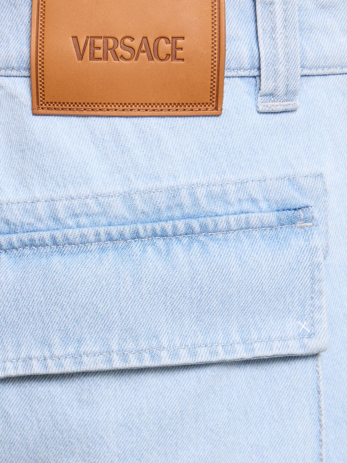 Shop Versace Bleached Cargo Jeans In Light Blue