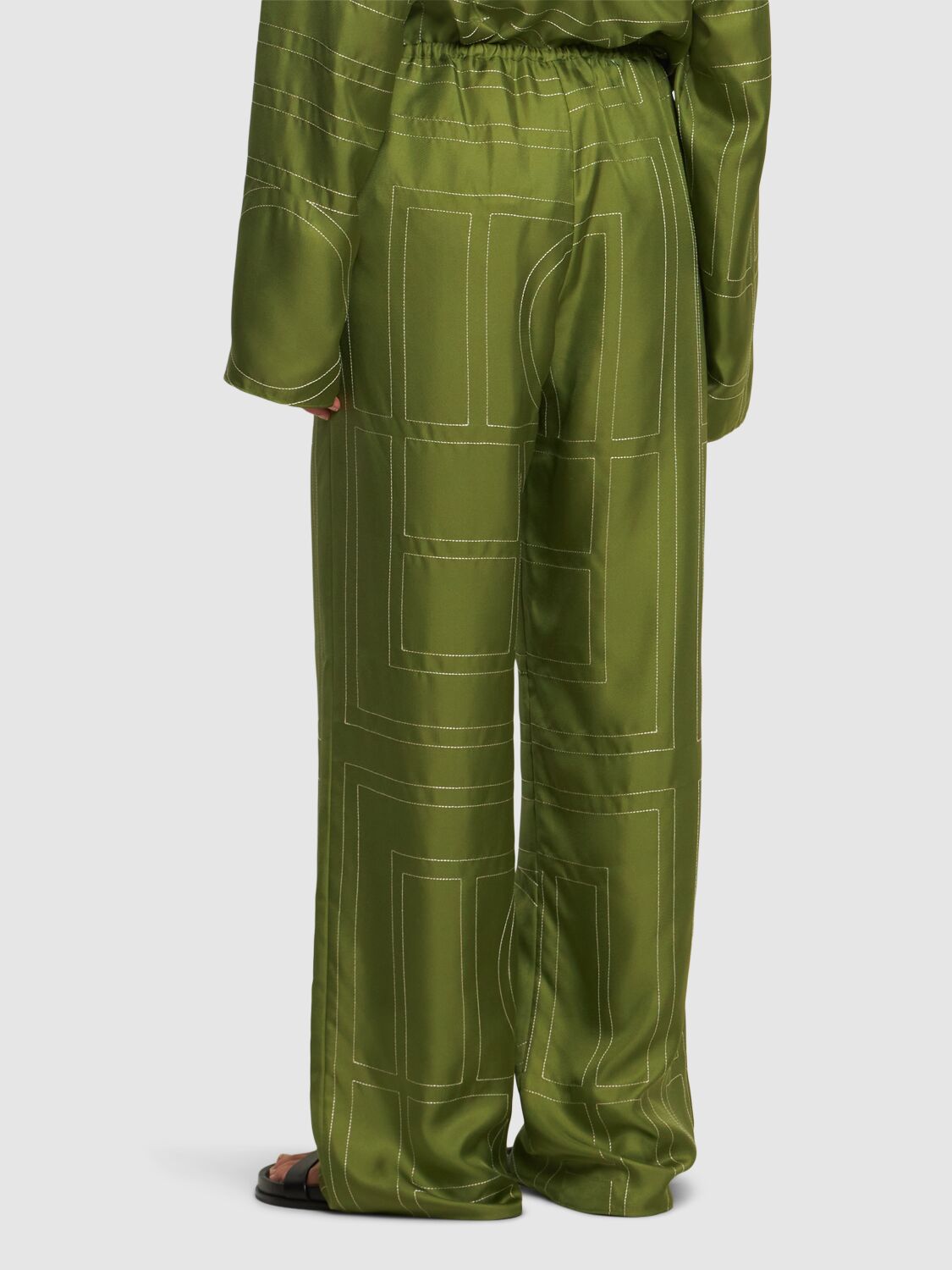 Shop Totême Monogram Silk Pajama Pants In Green