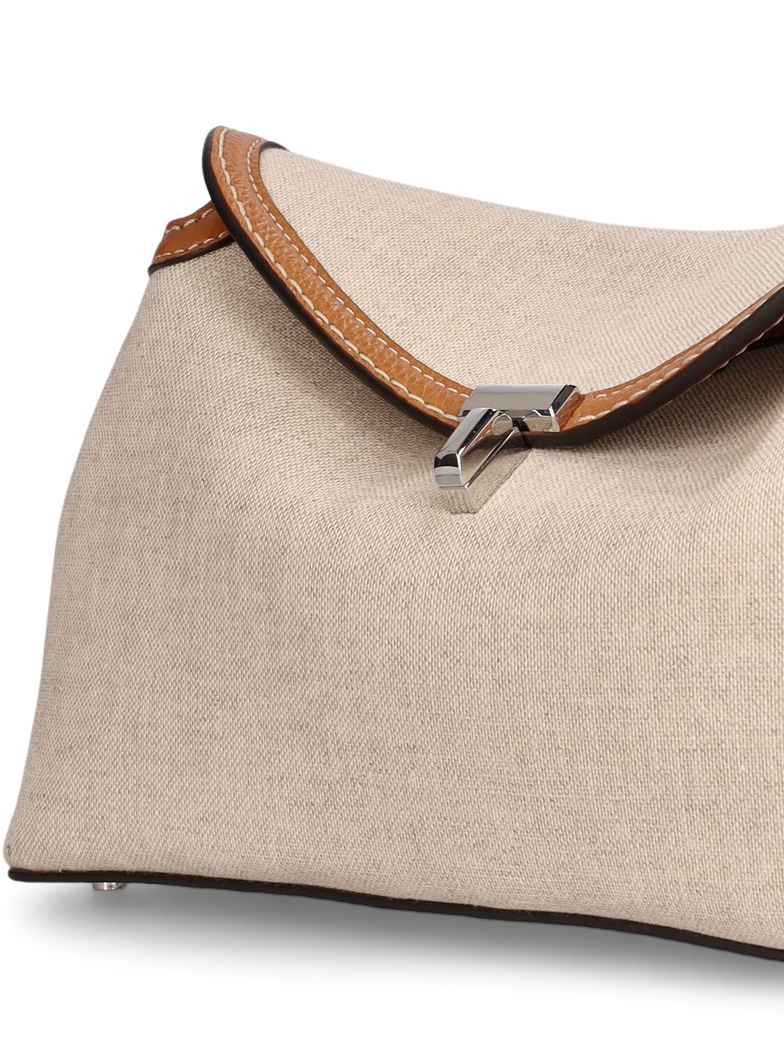 Shop Totême T-lock Canvas Clutch In Ecru,tan