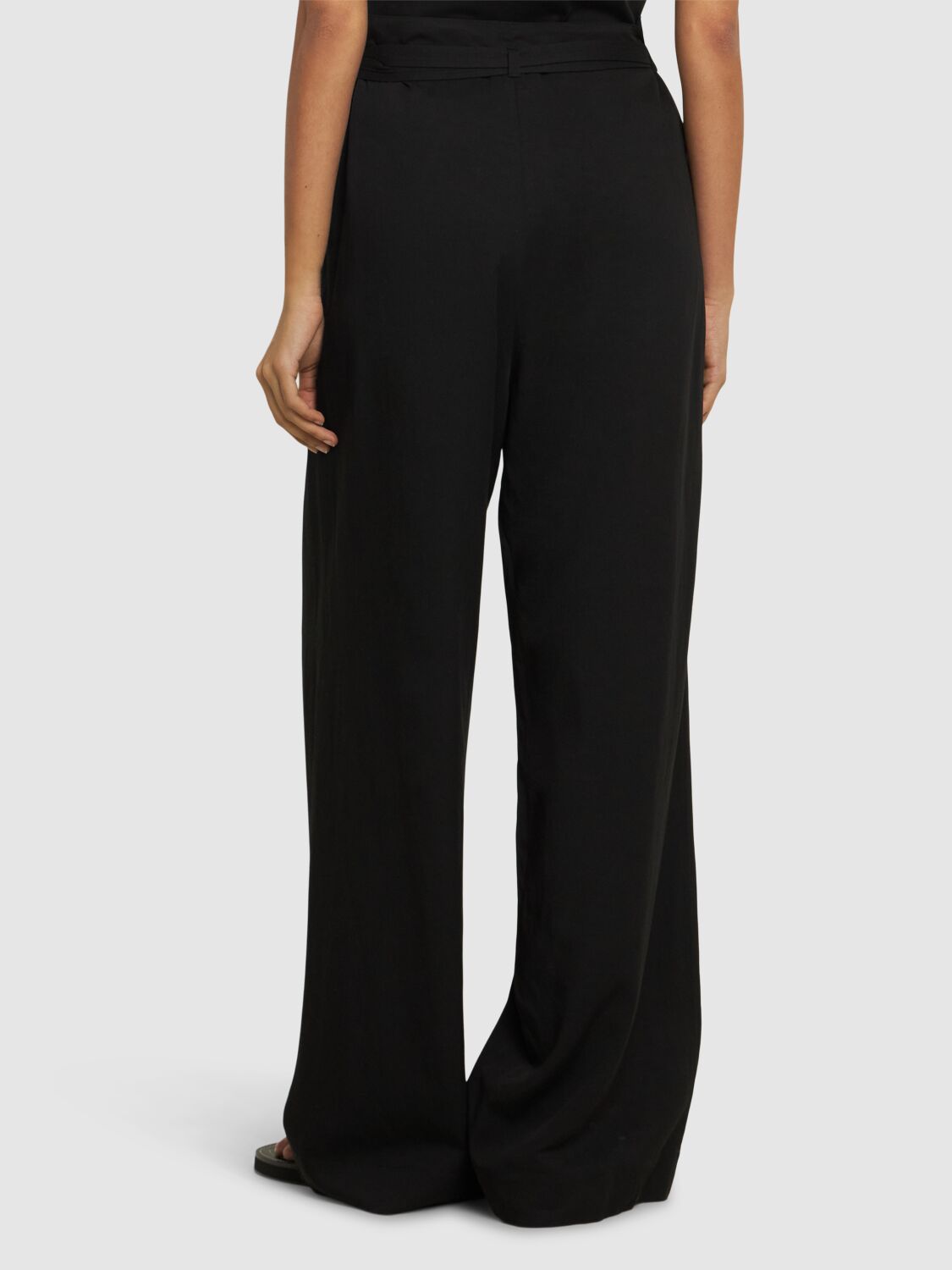 Shop Totême Fluid Viscose & Linen Wide Pants In Black