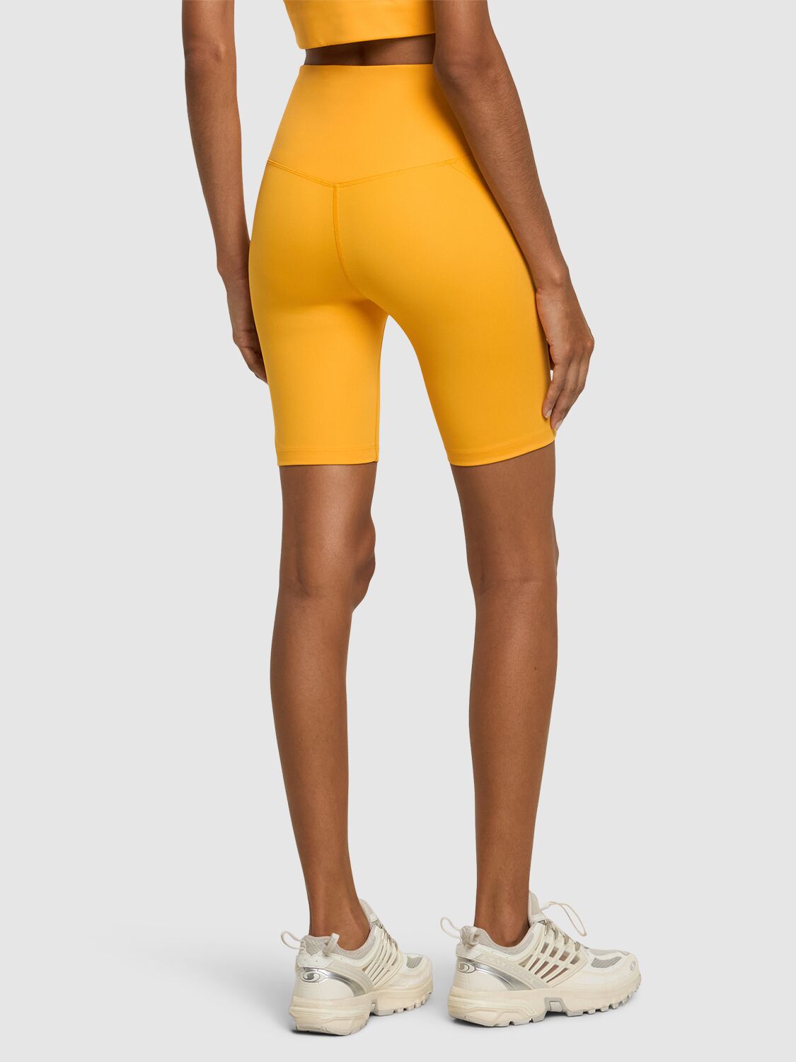 Shop Girlfriend Collective High Rise Stretch Tech Running Shorts In Yellow