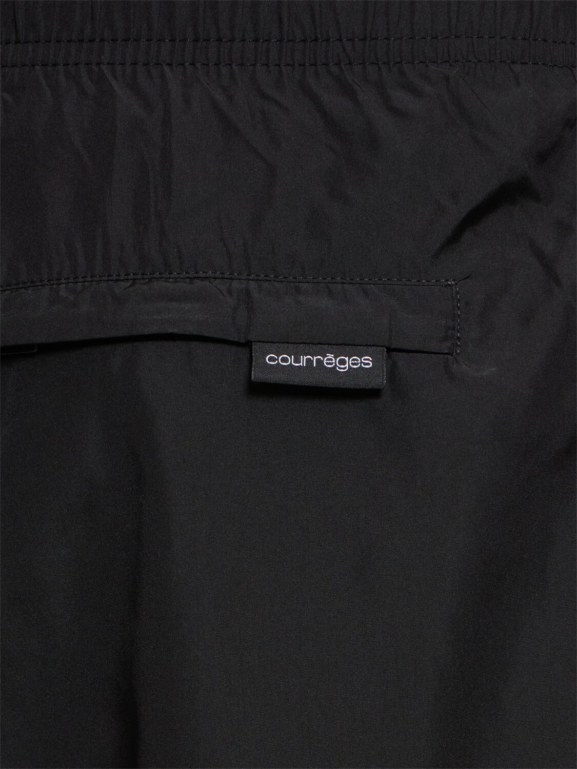 Shop Courrèges Logo Embroidery Tech Swim Shorts In 黑色