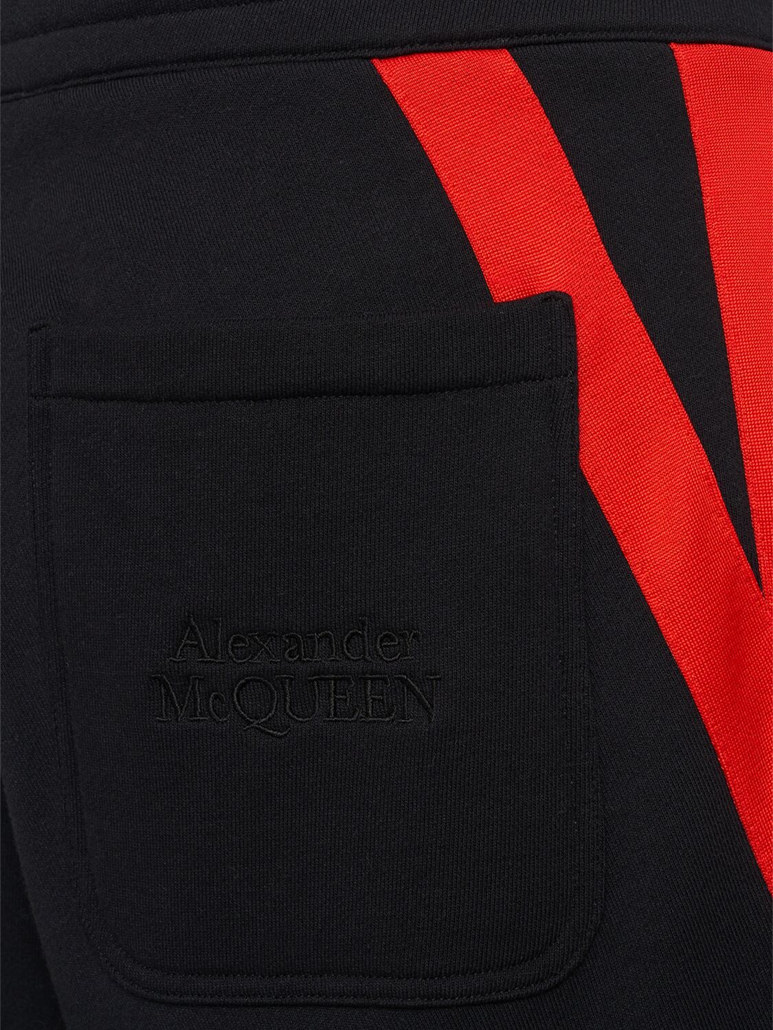 Shop Alexander Mcqueen Twisted Loopback Cotton Sweatpants In Black