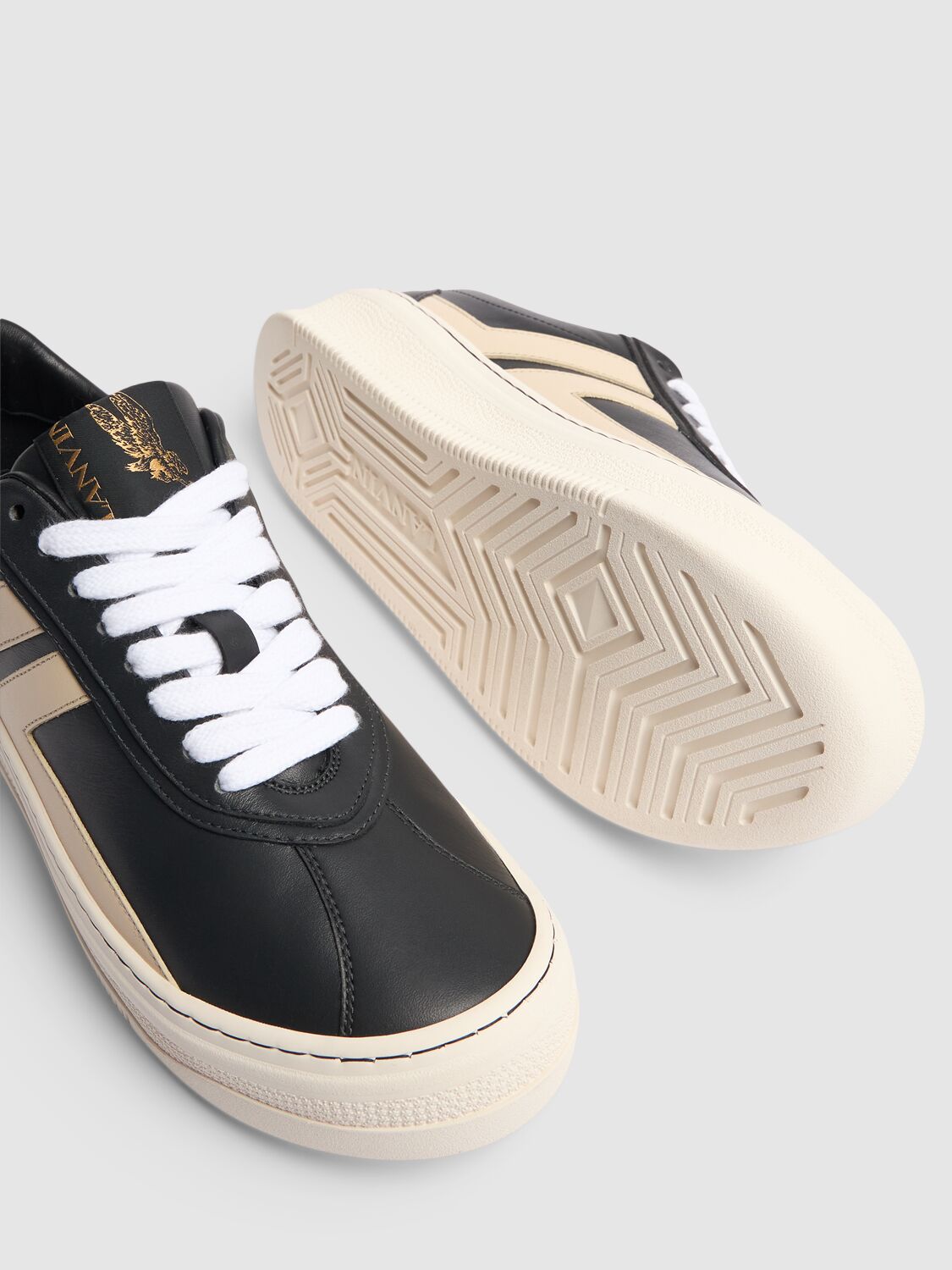 Shop Lanvin Pluto Leather Low Top Sneakers In Black,beige
