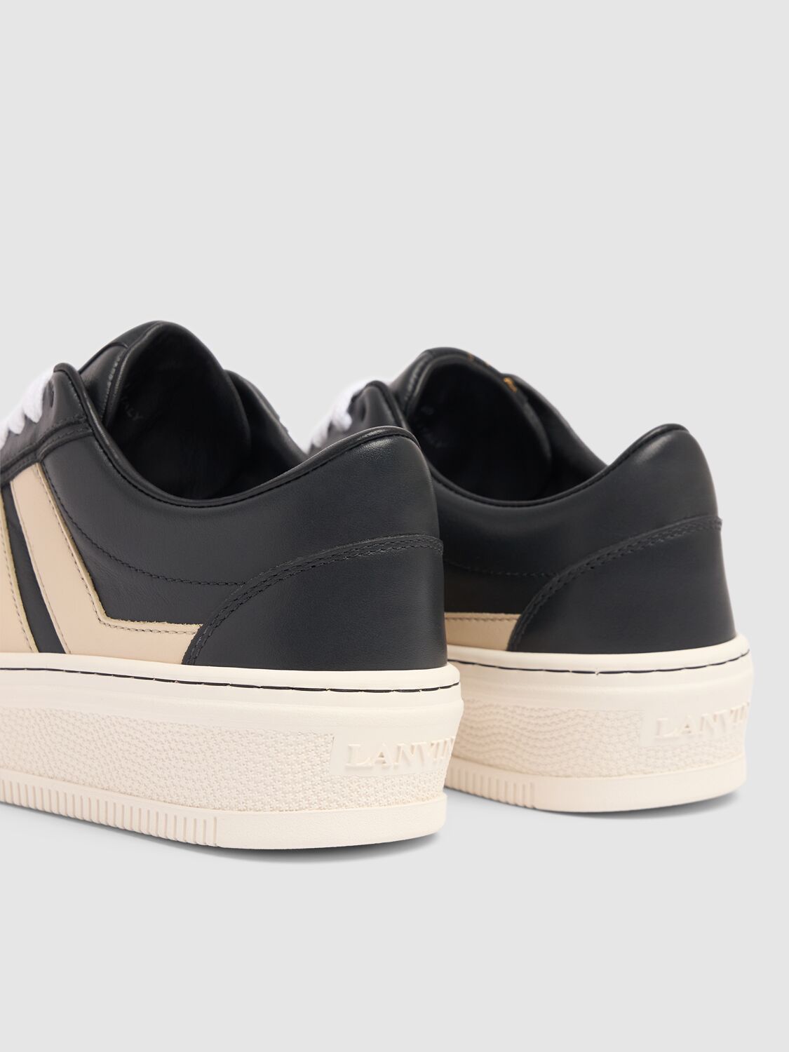 Shop Lanvin Pluto Leather Low Top Sneakers In Black,beige