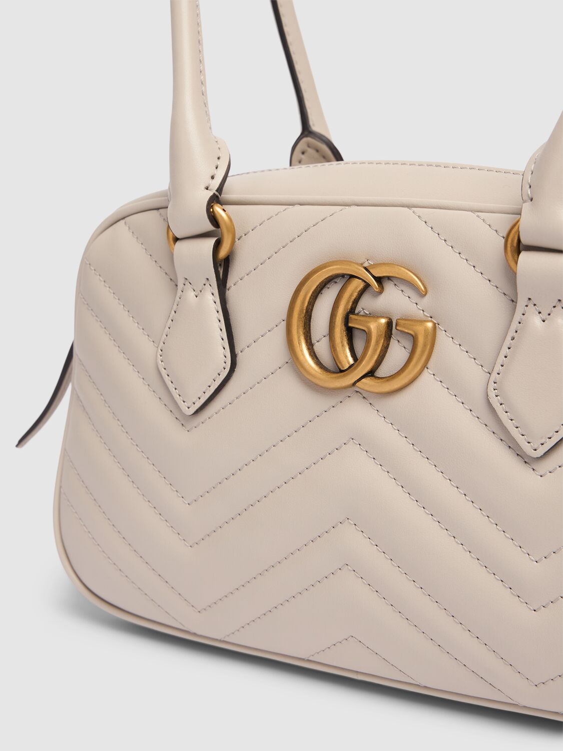 Shop Gucci Small Gg Marmont Leather Top Handle Bag In Sphinx