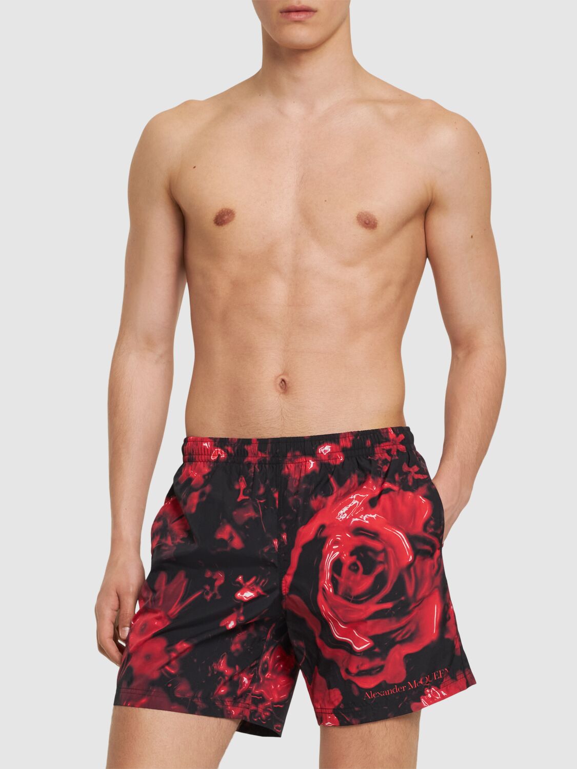 Shop Alexander Mcqueen Wax Floral Print Nylon Swim Shorts In Black,red