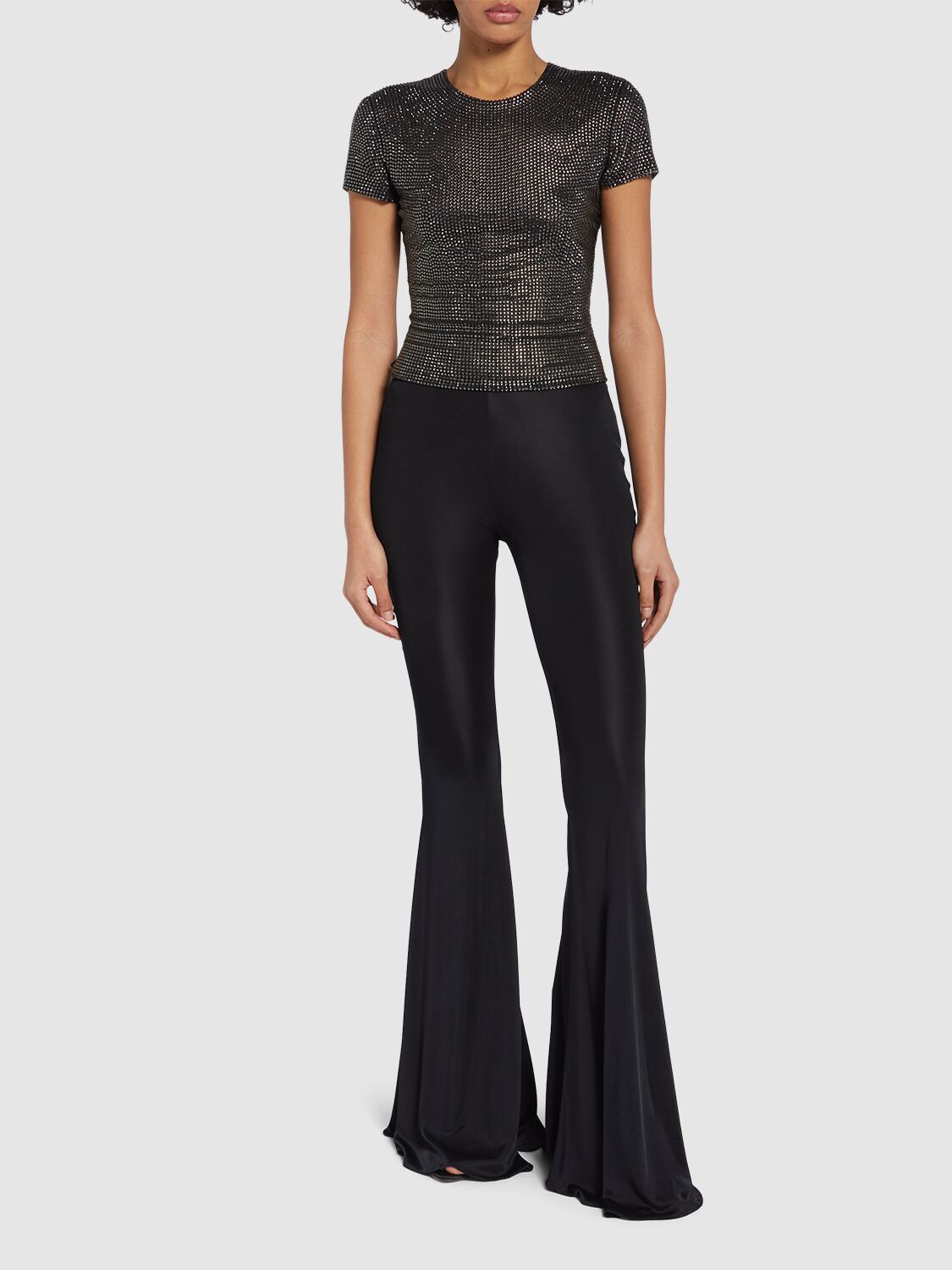 Shop Giuseppe Di Morabito Shiny Viscose Jersey Flared Pants In Black