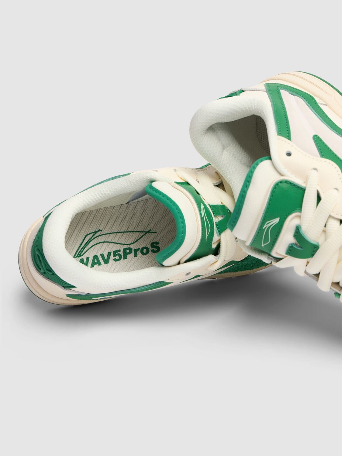 Shop Li-ning Wave Pro S Sneakers In Egg Shell,green