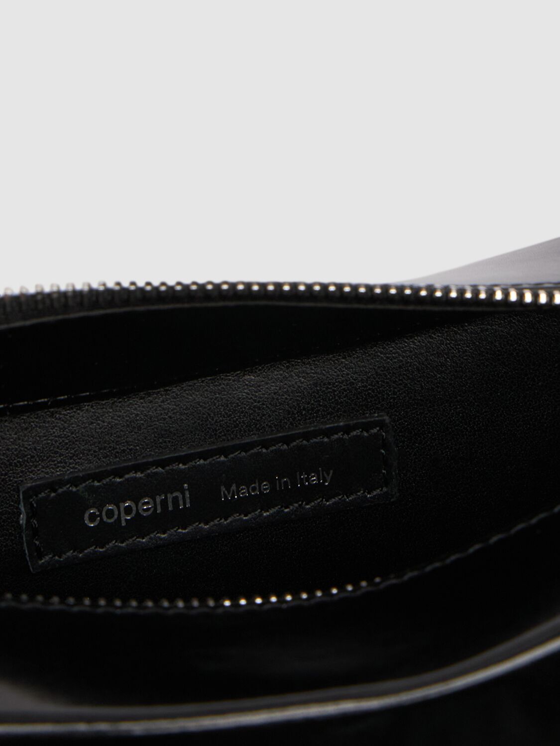 Shop Coperni Sound Swipe Gloss Leather Bag In Black