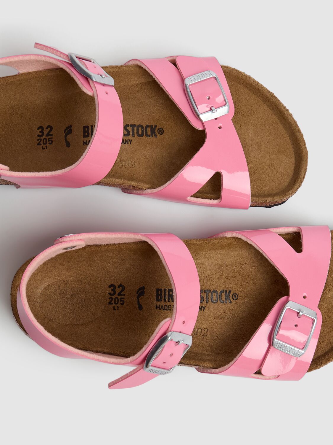 Shop Birkenstock Patent Rio Faux Leather Sandals In Pink