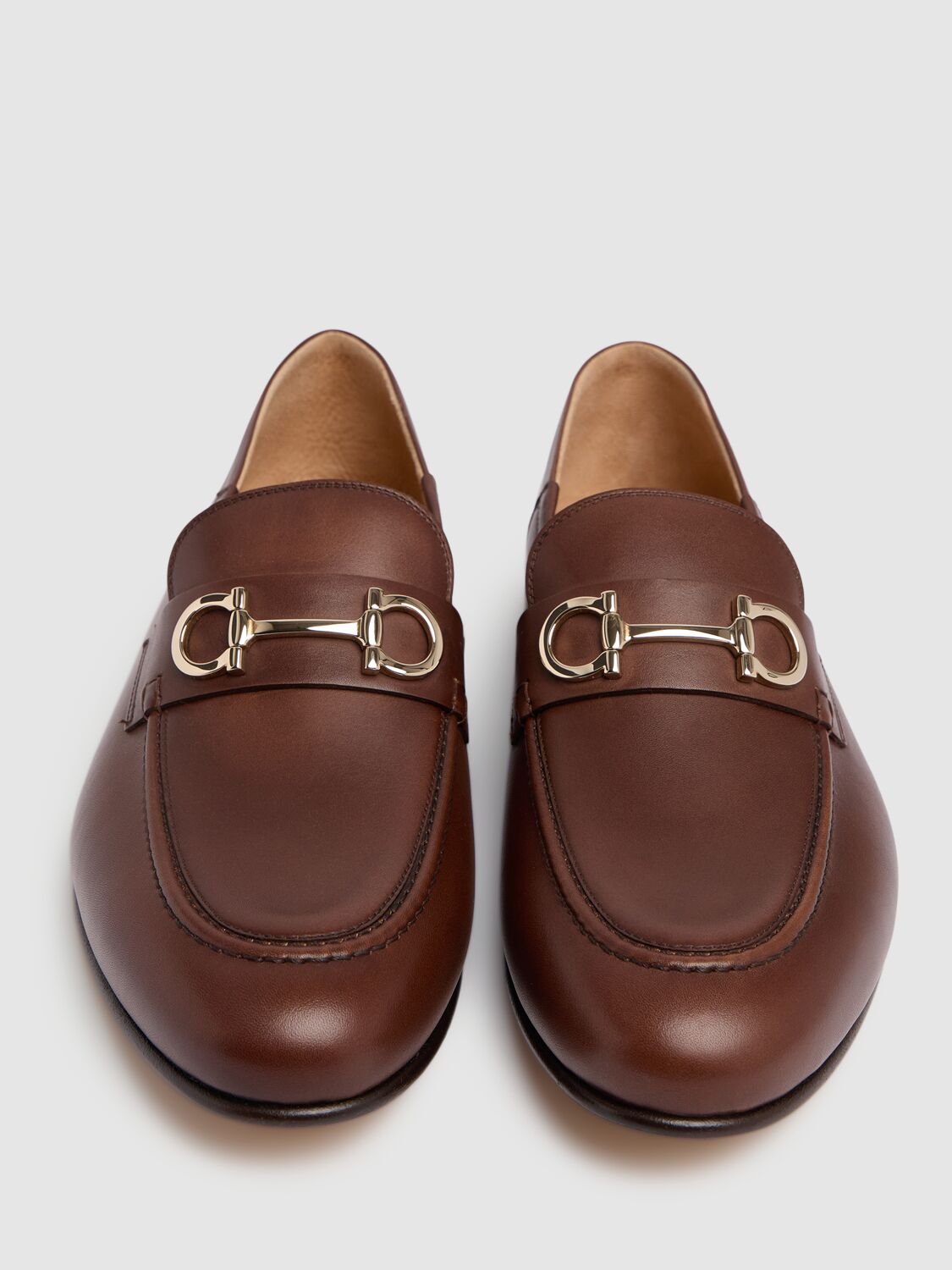 Shop Ferragamo Gin Leather Loafers In Cioccolato