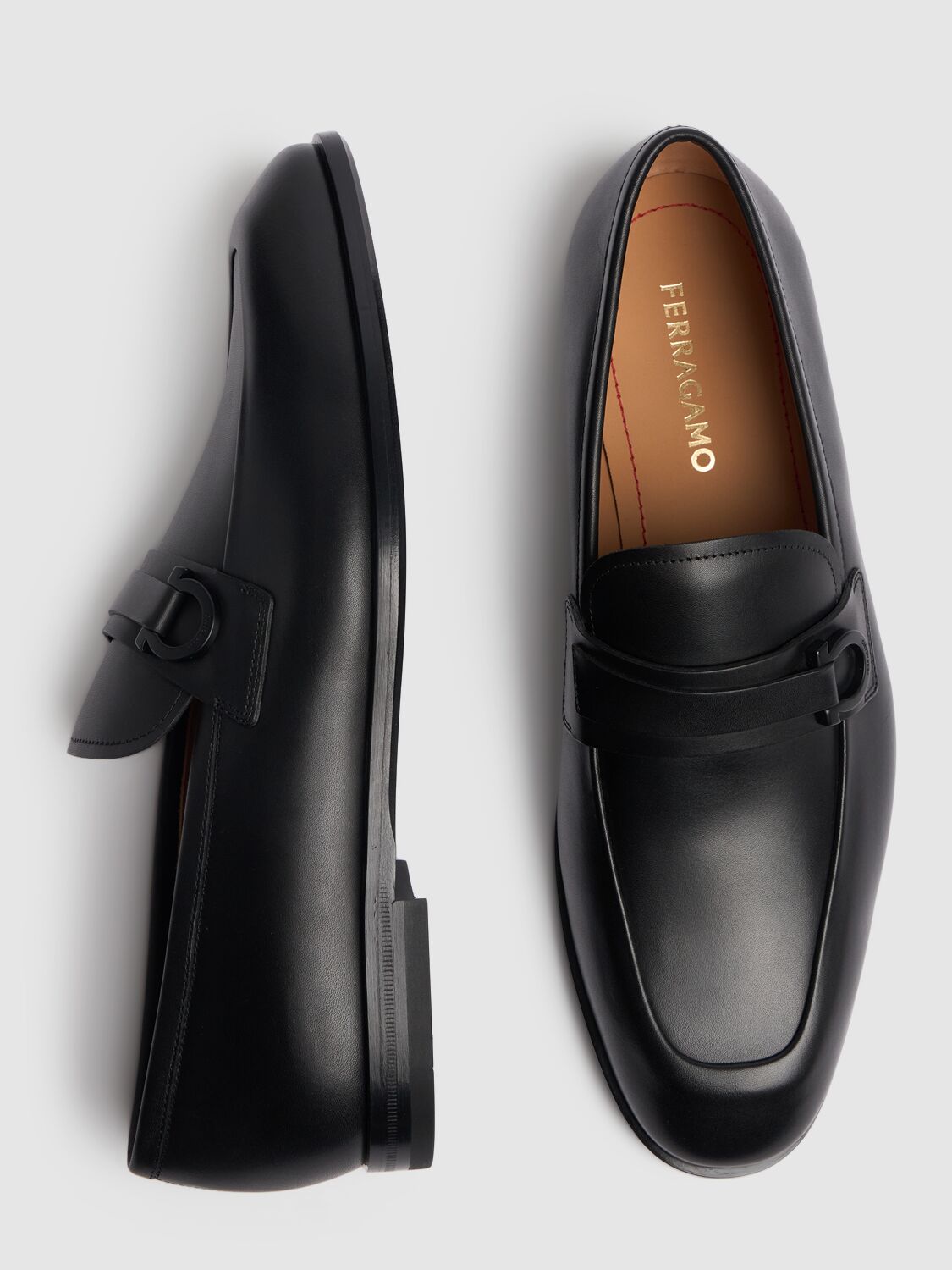 Shop Ferragamo Florio Leather Loafers In Black