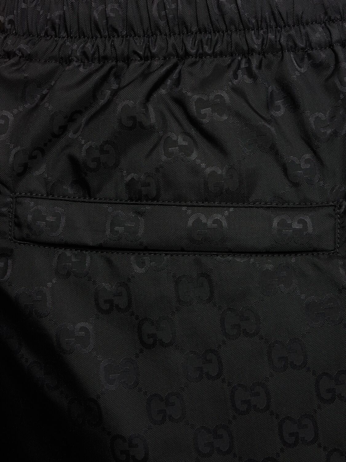 Shop Gucci Gg Logo Nylon Shorts In Black