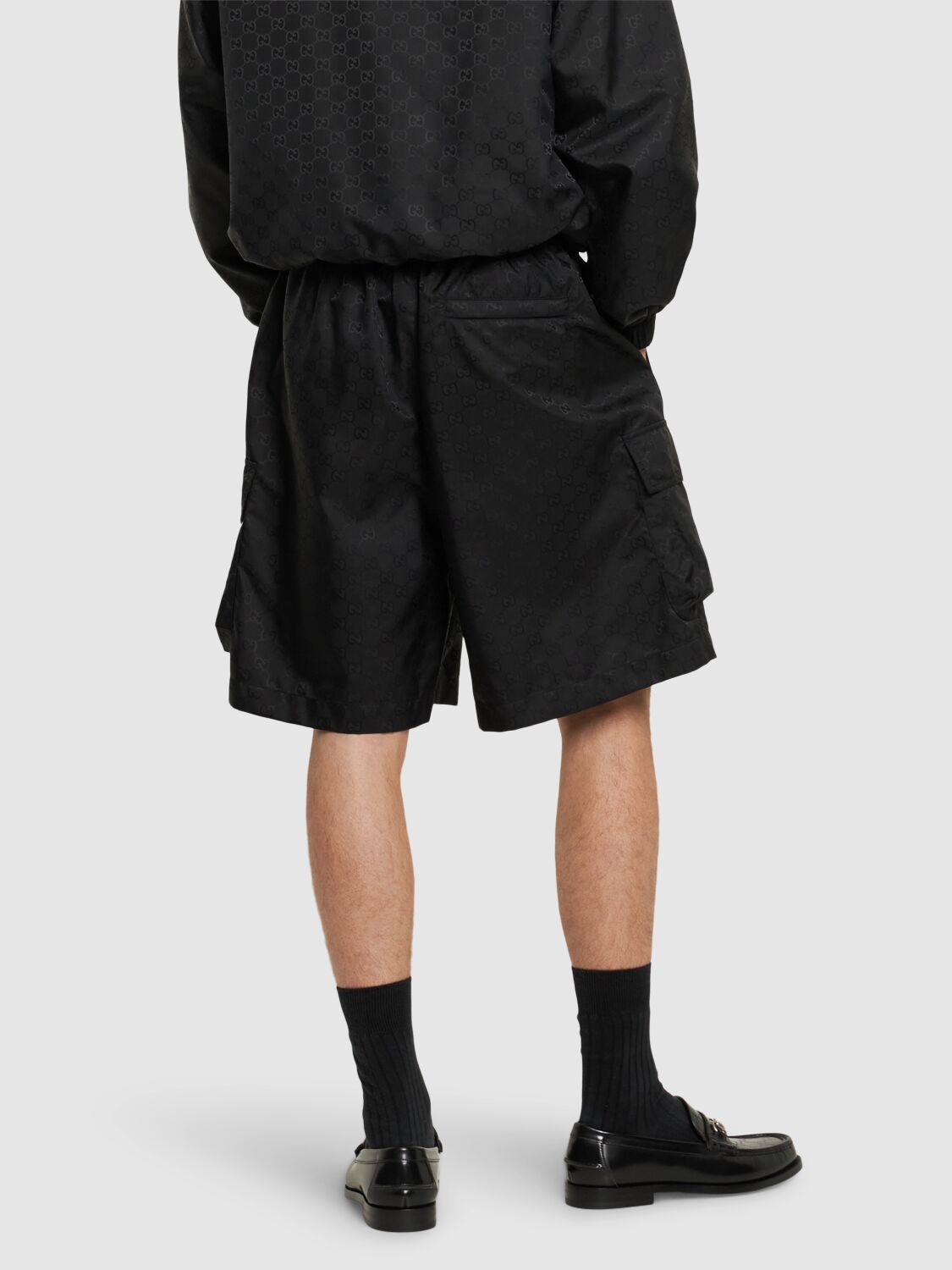 Shop Gucci Gg Logo Nylon Shorts In Black