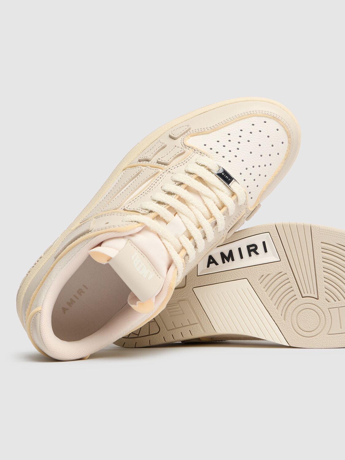 Shop Amiri Collegiate Skel Top Low Sneakers In White/beige