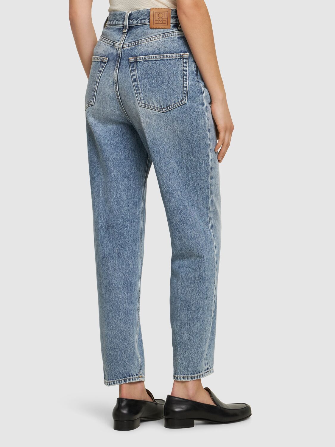 Shop Totême Tapered Leg Organic Denim Jeans In Light Blue