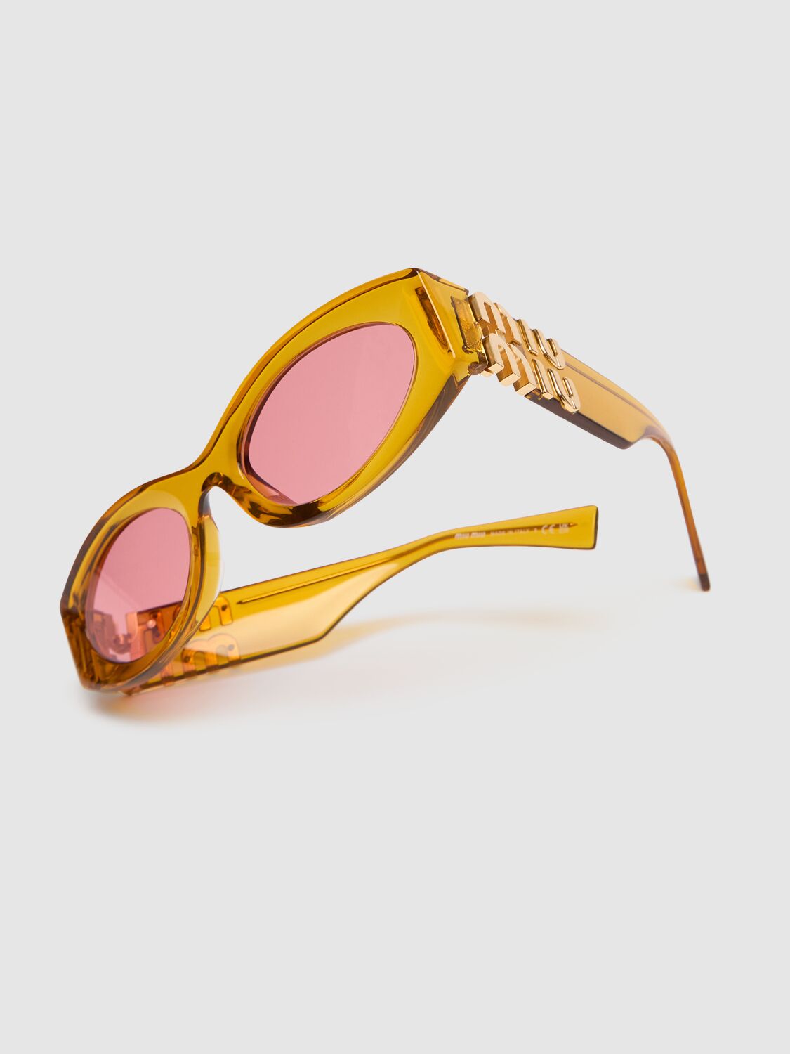 Shop Miu Miu Round Acetate Sunglasses In Yellow,pink