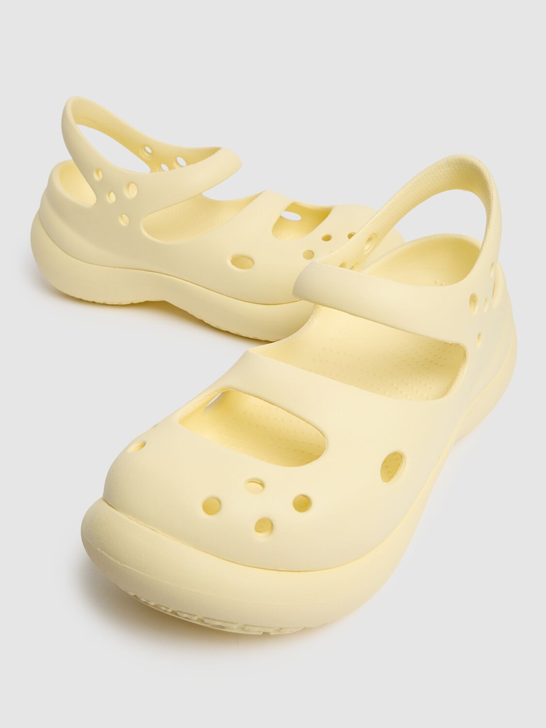 Shop Crocs Phaedra Clogs In White/beige