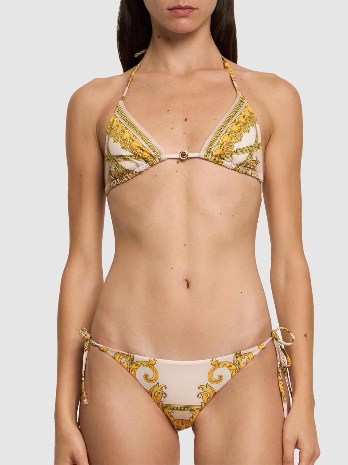 Shop Versace Printed Lycra Bikini Bottoms In 金色/多色