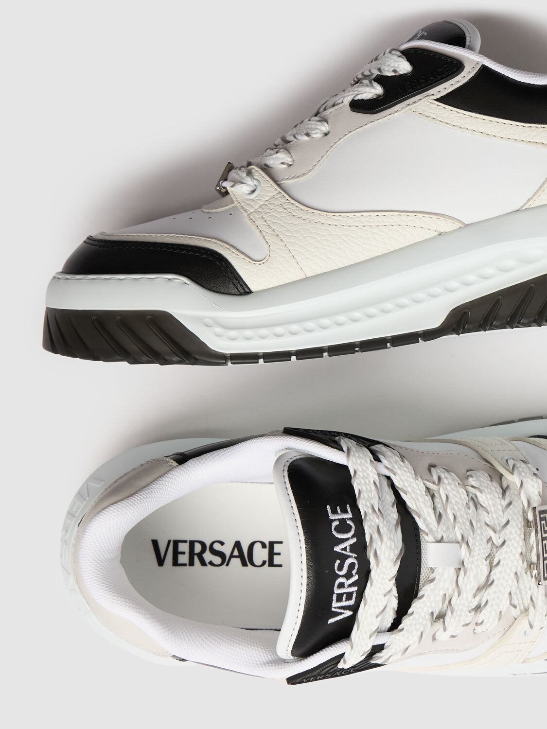 Shop Versace Mesh Low Top Sneakers In Black,white