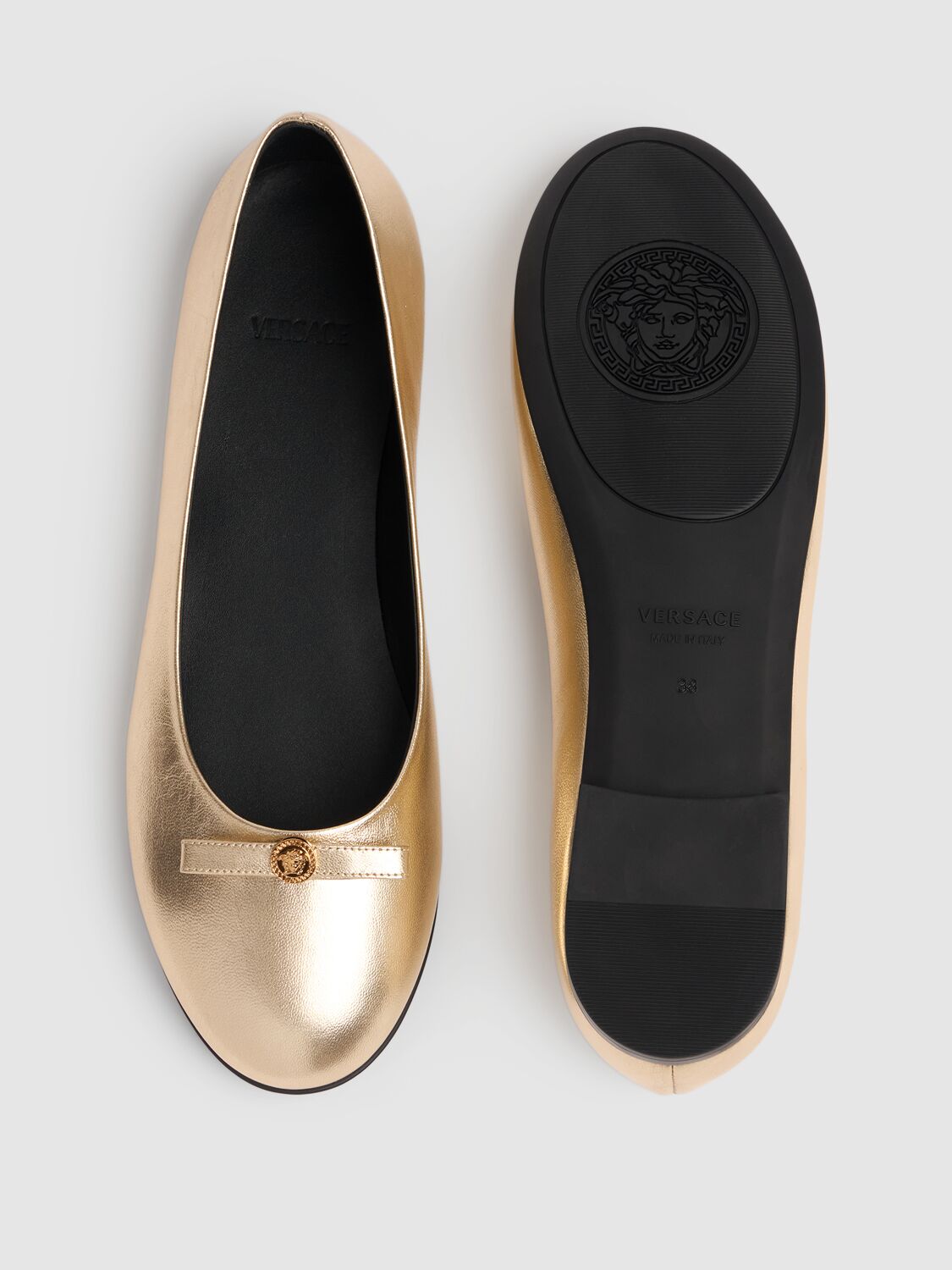 Shop Versace Metallic Leather Ballerinas W/bow In Gold