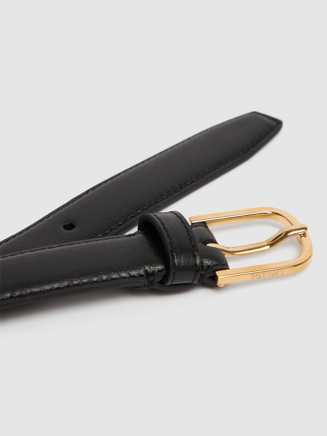 Shop Totême Slim Palmellata Leather Belt In Black