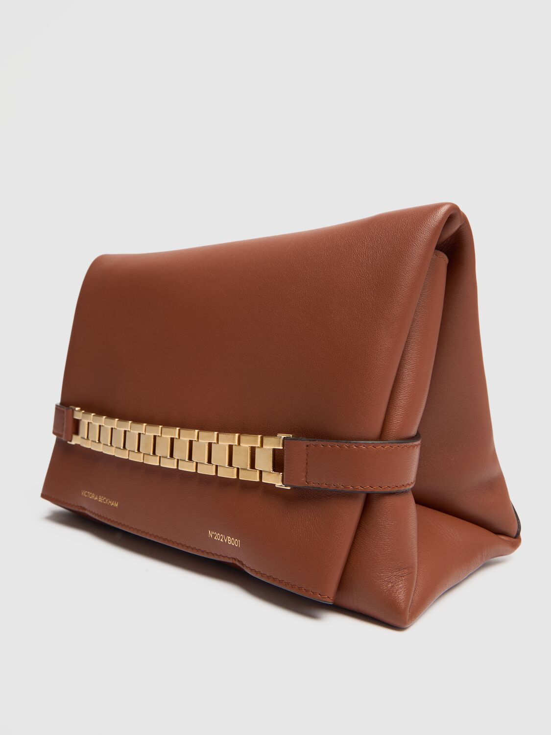 Shop Victoria Beckham Chain Napa Leather Clutch In Russet