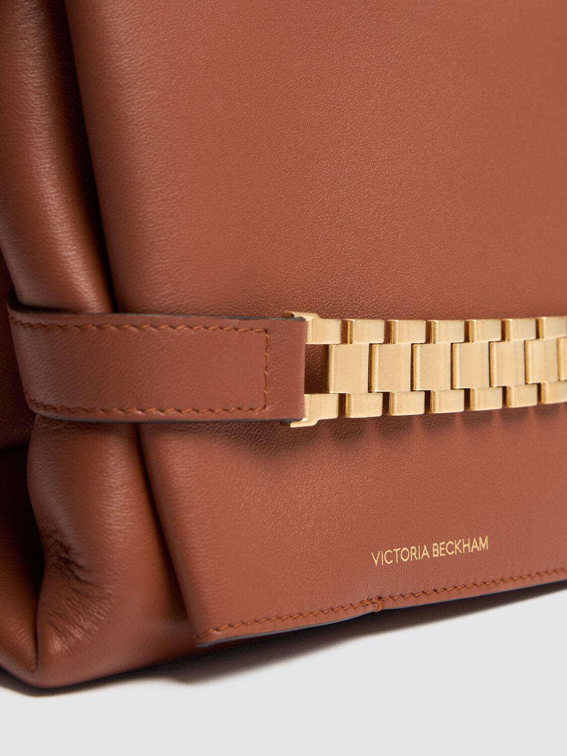 Shop Victoria Beckham Chain Napa Leather Clutch In Russet