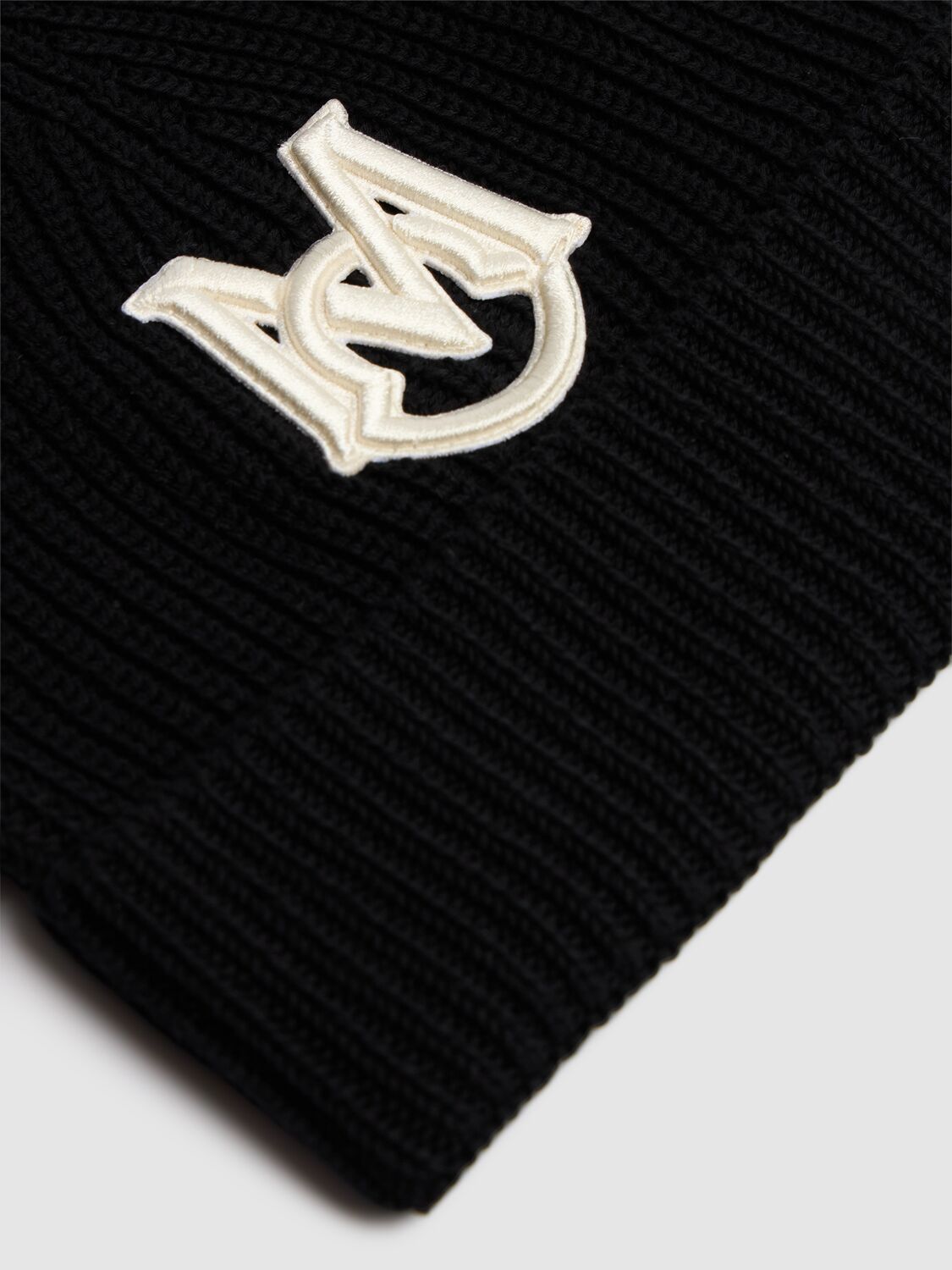 Shop Moncler Embroidered Monogram Cotton Beanie In Black