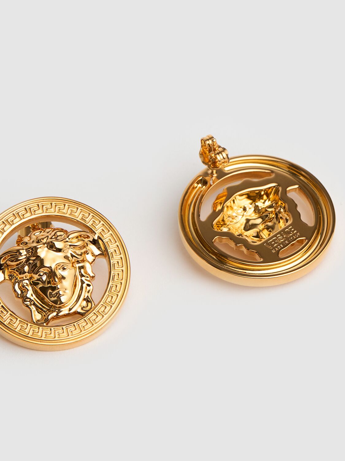 Shop Versace Logo Stud Earrings In Gold