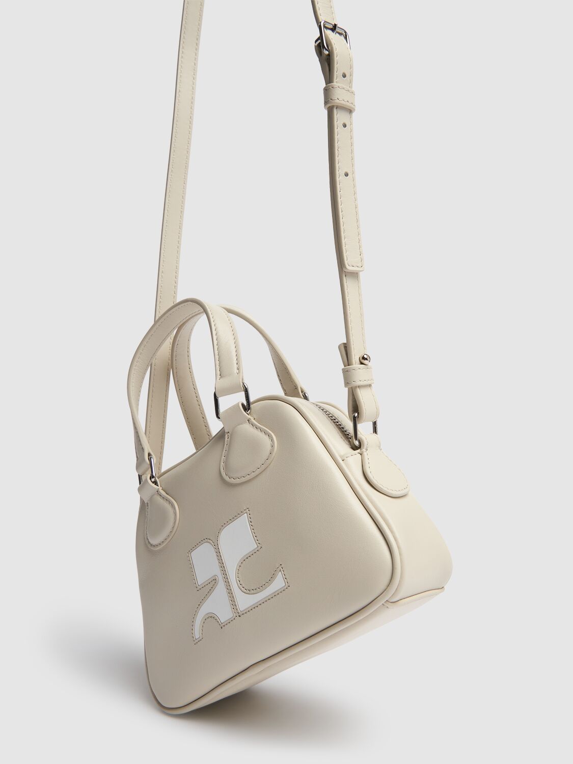 Shop Courrèges Mini Reedition Bowling Leather Bag In White