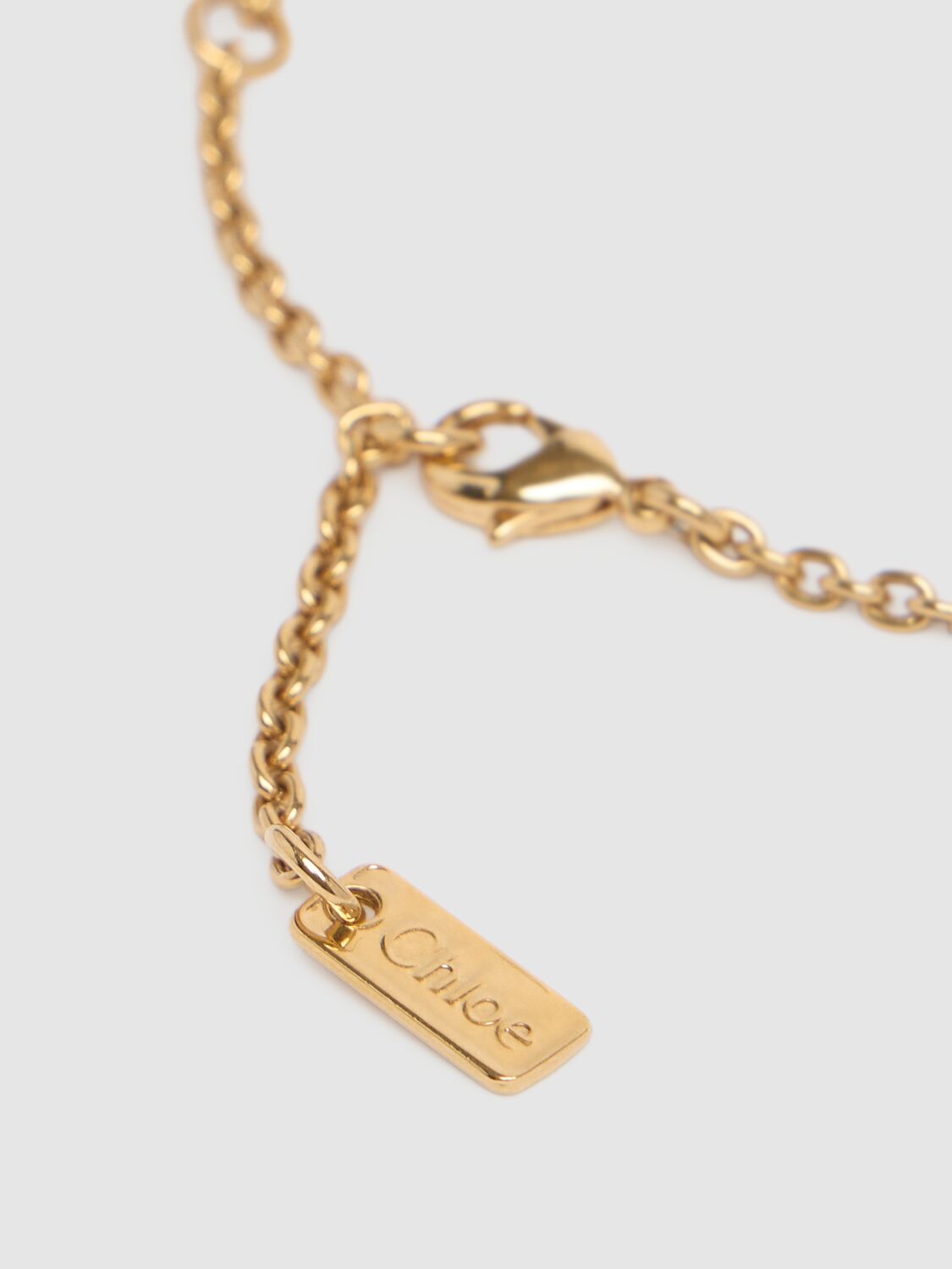 Shop Chloé C  Logo Necklace In Antique Gold