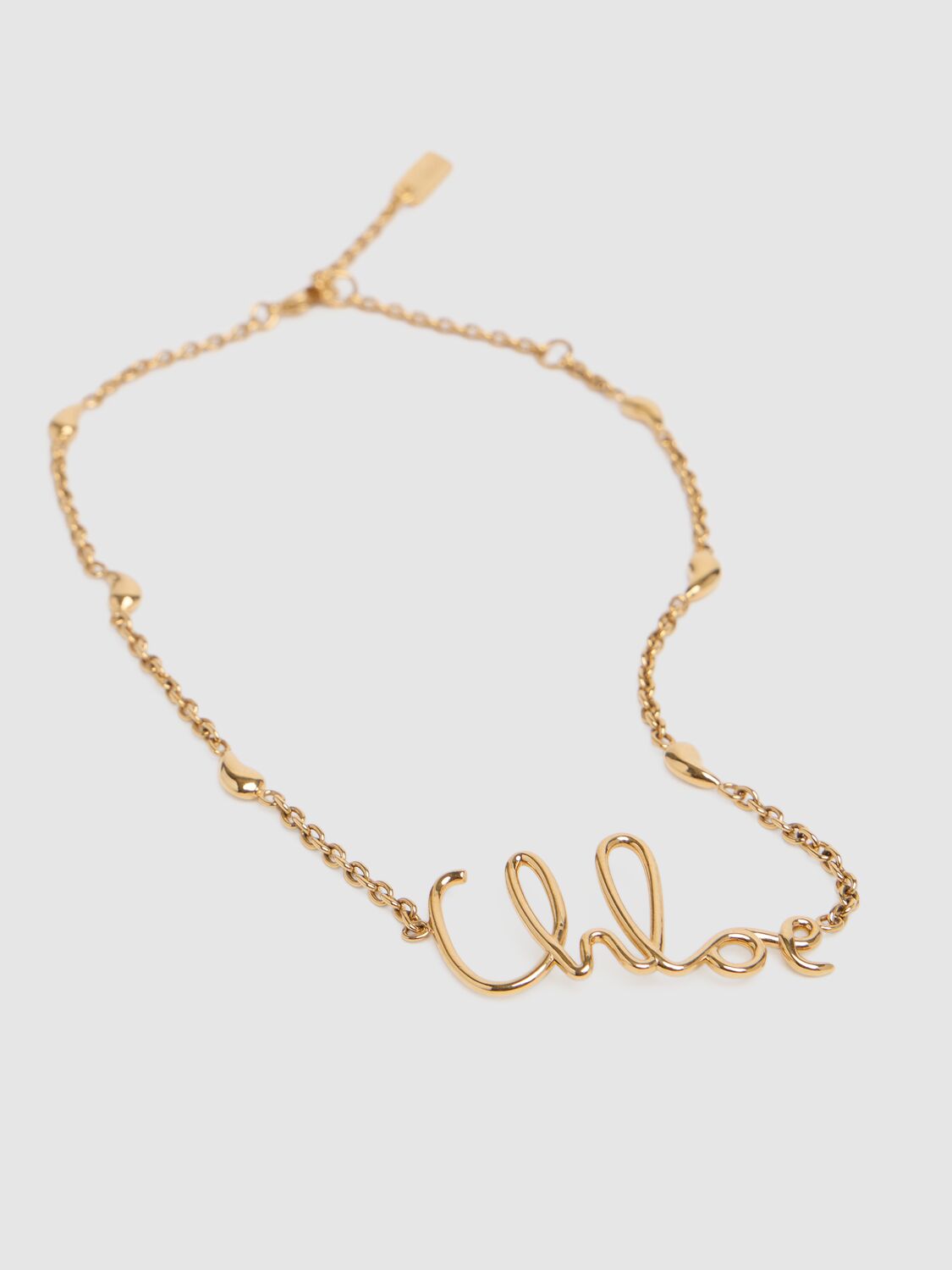 Shop Chloé C  Logo Necklace In Antique Gold