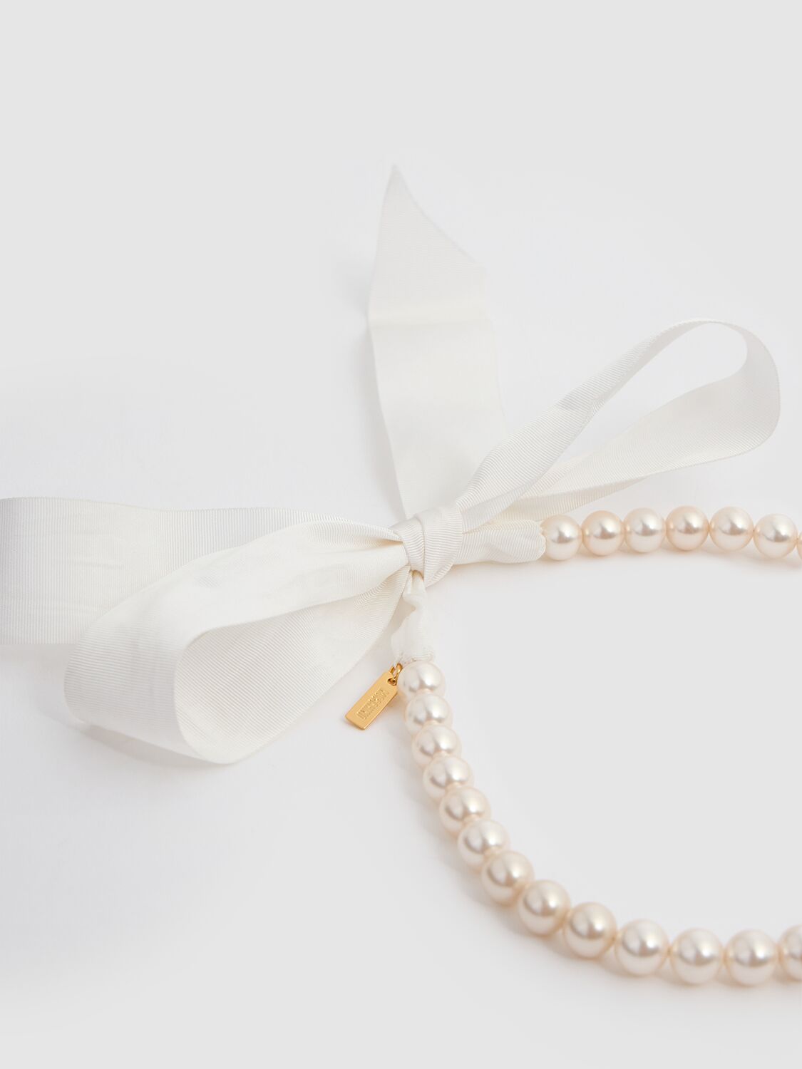 Shop Moschino Faux Pearl & Bow Collar Necklace In Ivory