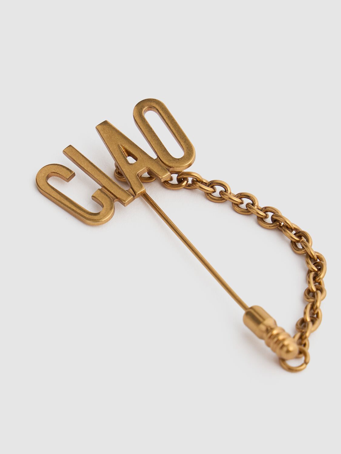 Shop Moschino Small Ciao Pin In Oro Vecchio