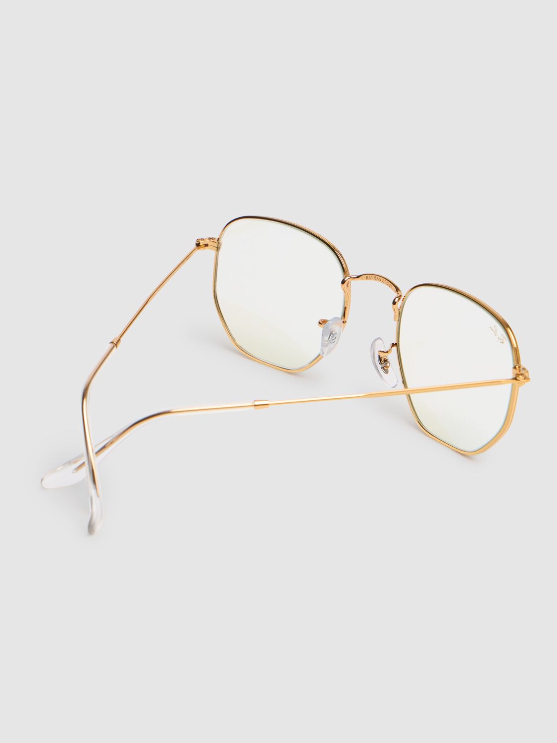 Shop Ray Ban Hexagonal Flat Lens Metal Sunglasses In Gold/transparen