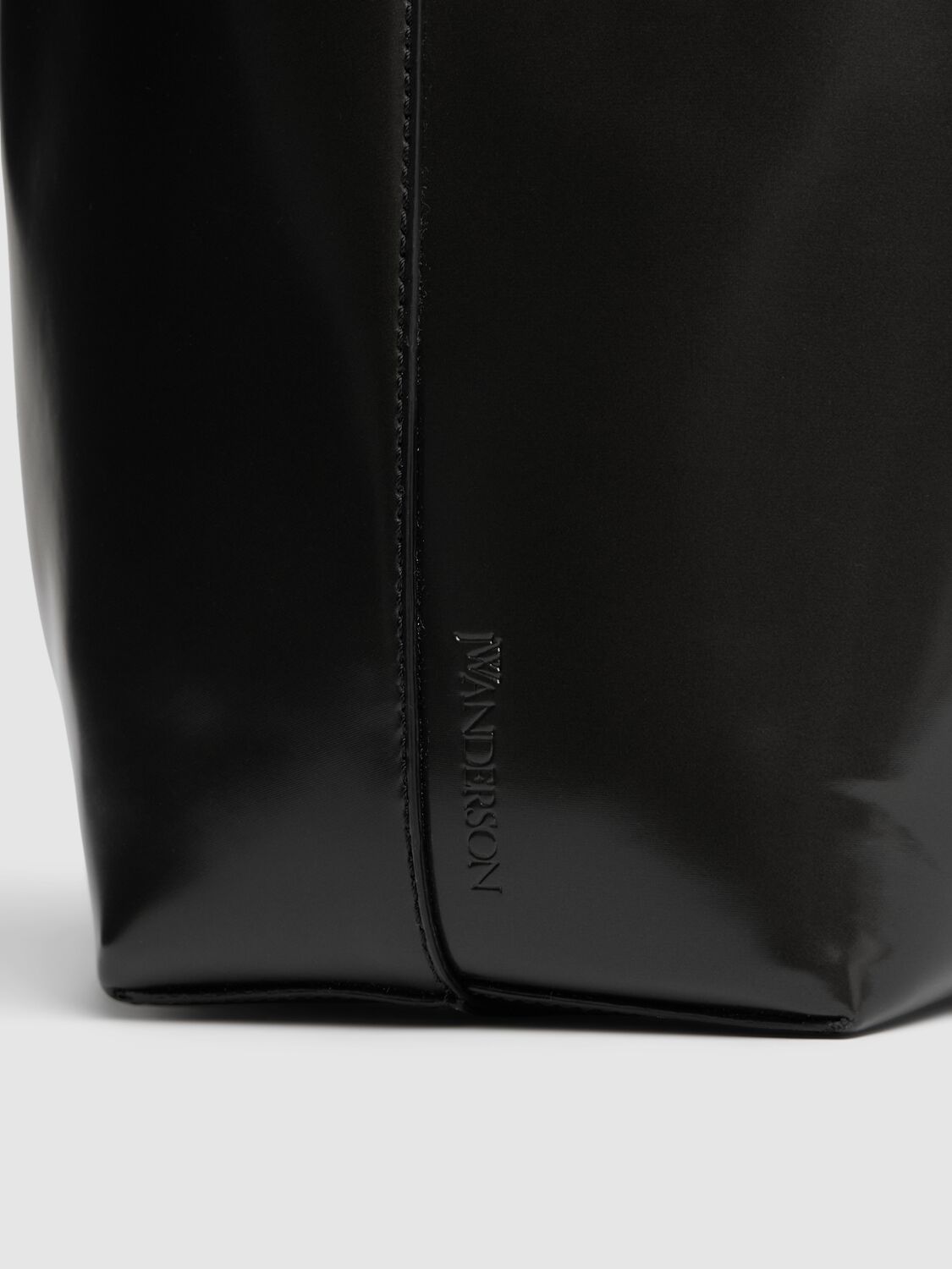 Shop Jw Anderson Small Corner Bucket Leather Bag In Black