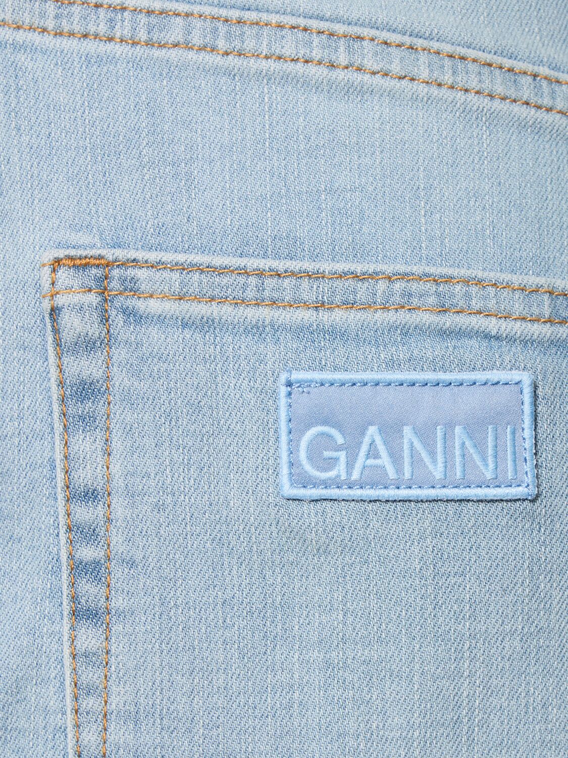 Shop Ganni Andi Tinted Denim Jeans In Blue